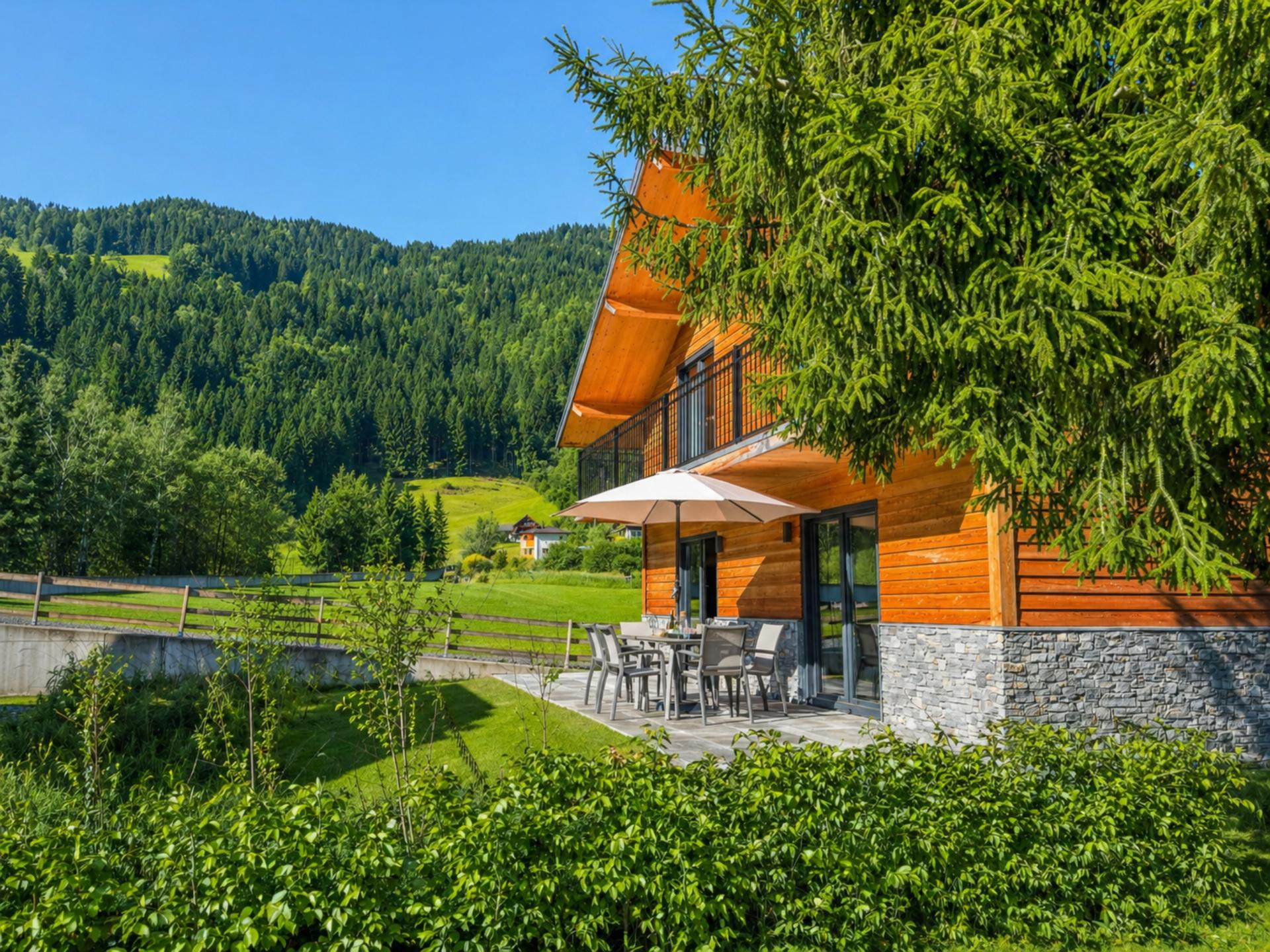 Chalet aan de Afritzer See met privé sauna en uitzicht op de Alpen - foto 17