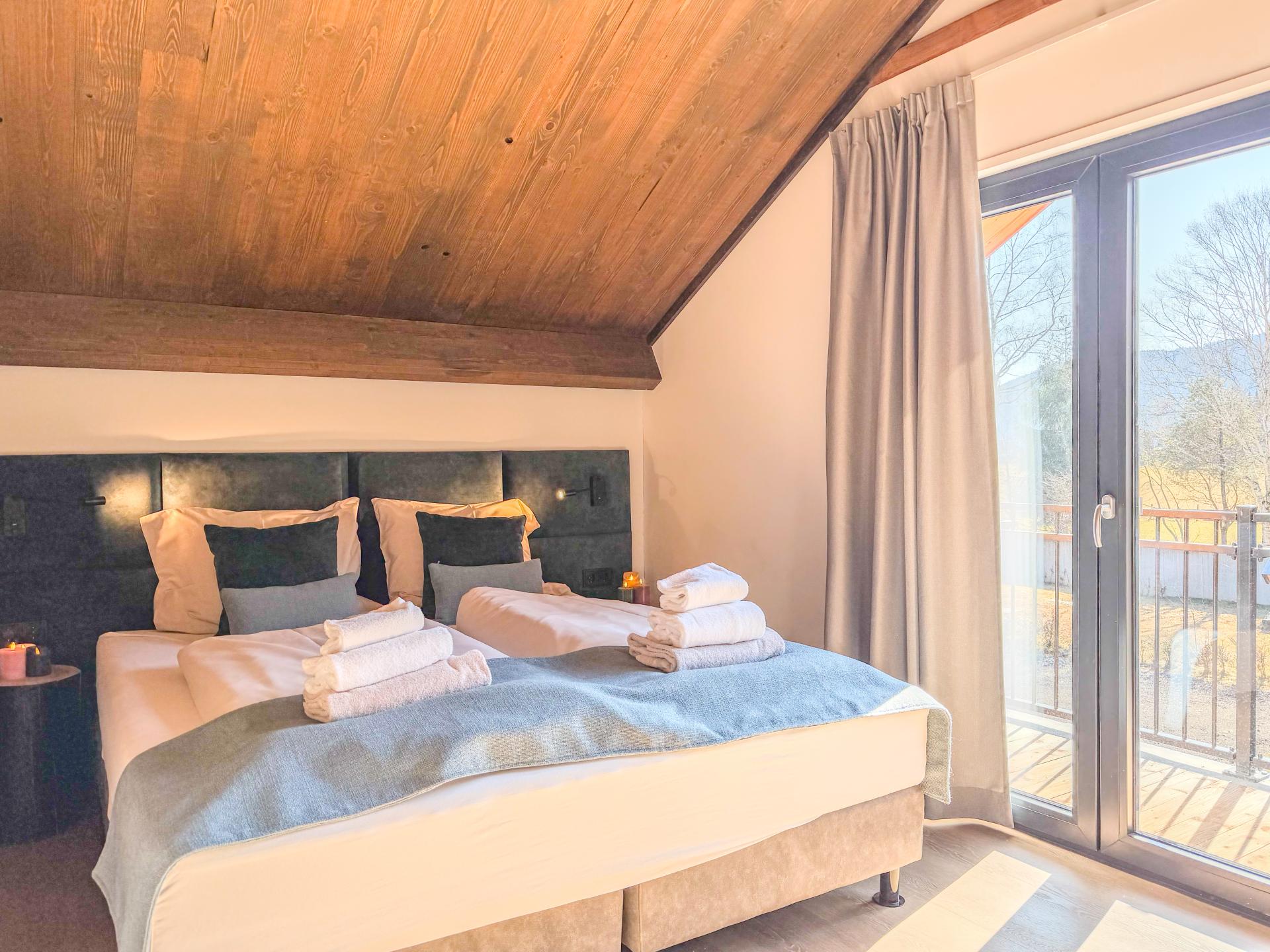 Chalet aan de Afritzer See met privé sauna en uitzicht op de Alpen - foto 9