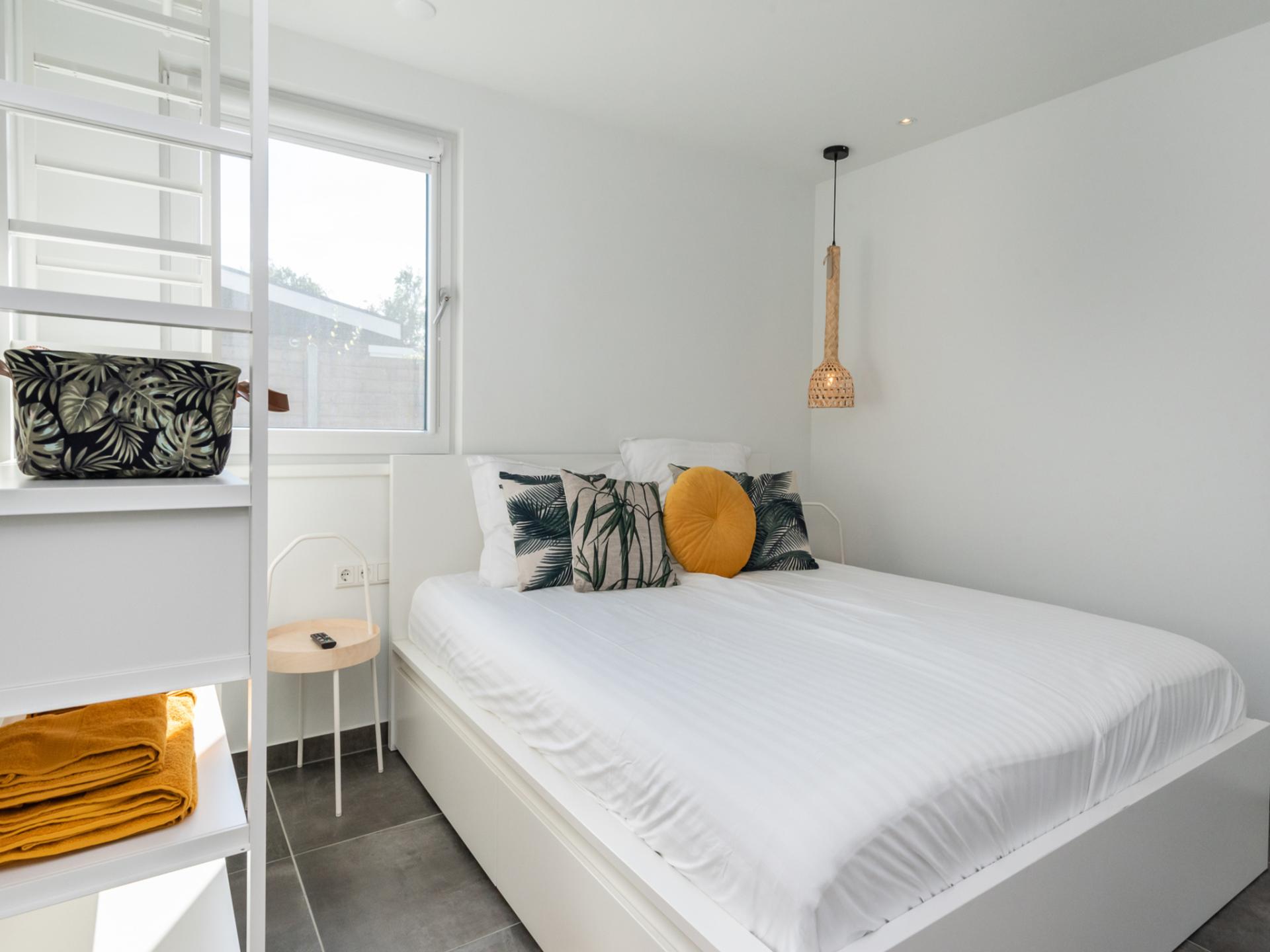 Luxe bungalow aan het Veerse Meer met overdekt terras en buitenhaard - foto 15