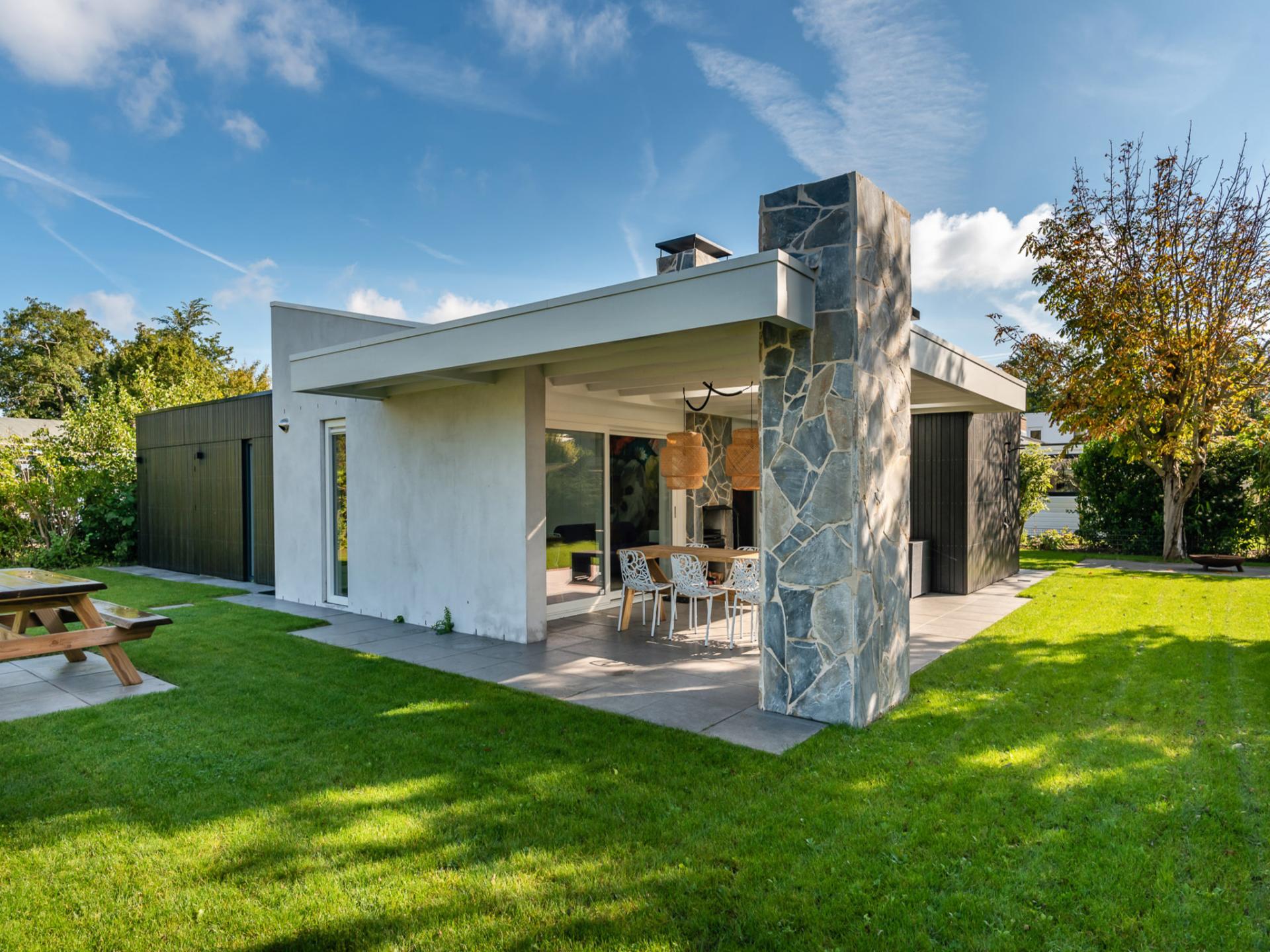 Luxe bungalow aan het Veerse Meer met overdekt terras en buitenhaard - foto 22