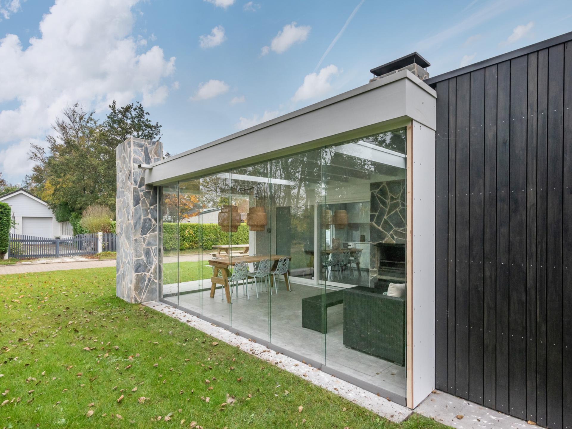 Luxe bungalow aan het Veerse Meer met overdekt terras en buitenhaard - foto 6