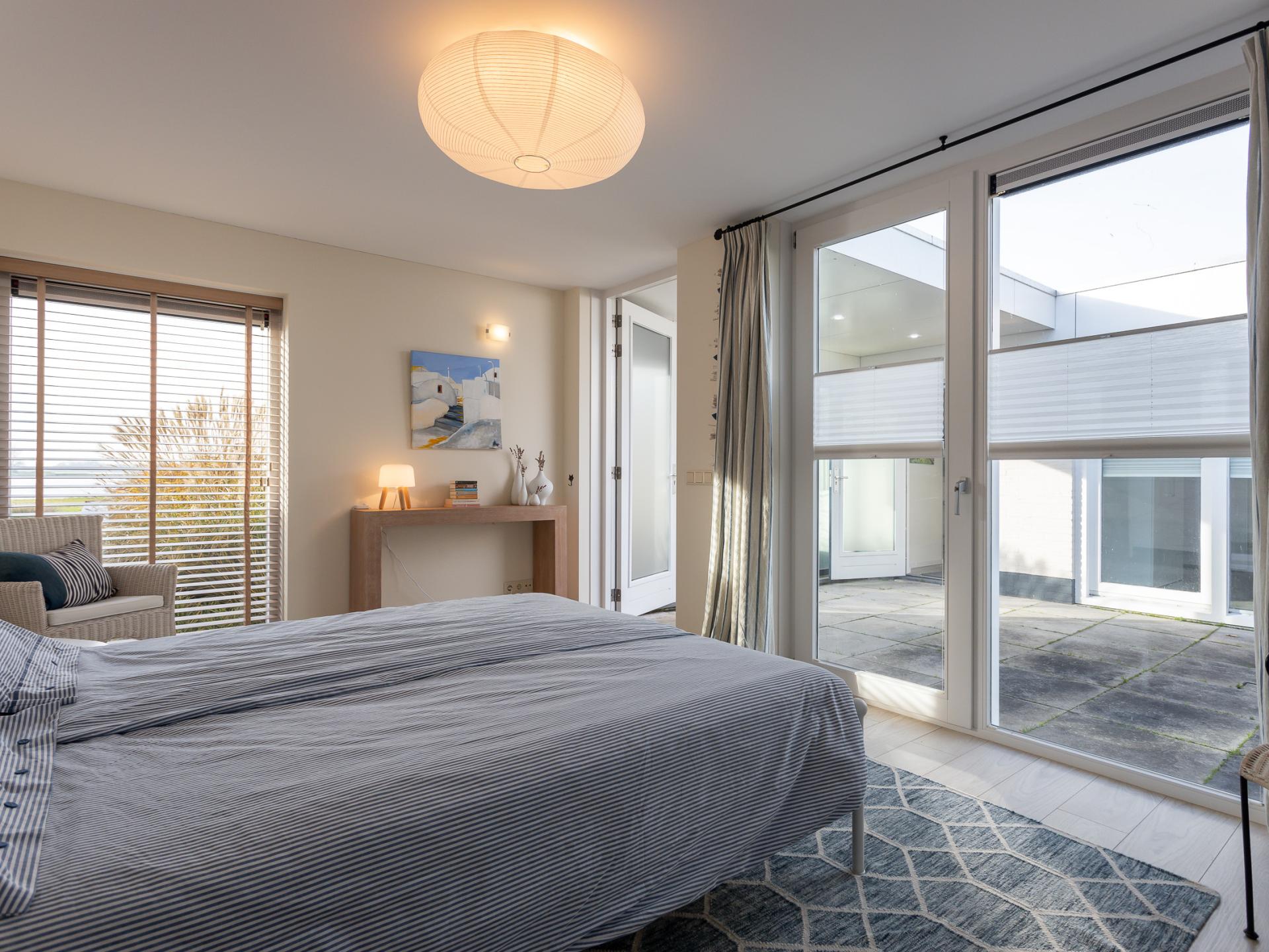 Watervilla Veerse Meer: luxe vrijstaand verblijf met panoramisch waterzicht - foto 27