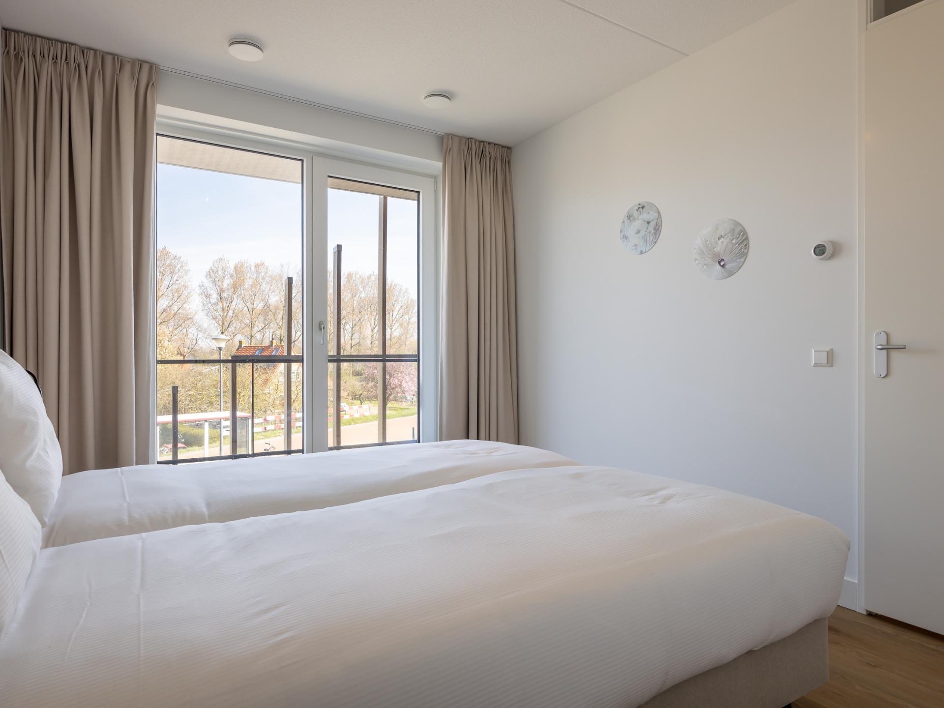 Stijlvol havenappartement met balkon en Sunshower in Kortgene - foto 30