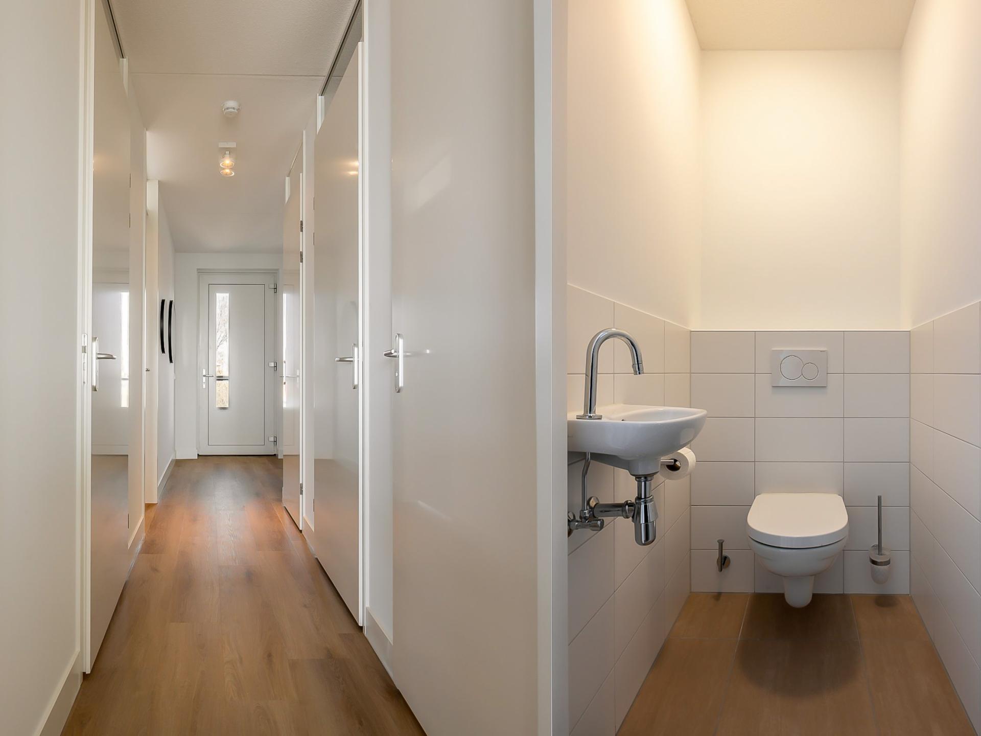 Stijlvol havenappartement met balkon en Sunshower in Kortgene - foto 26