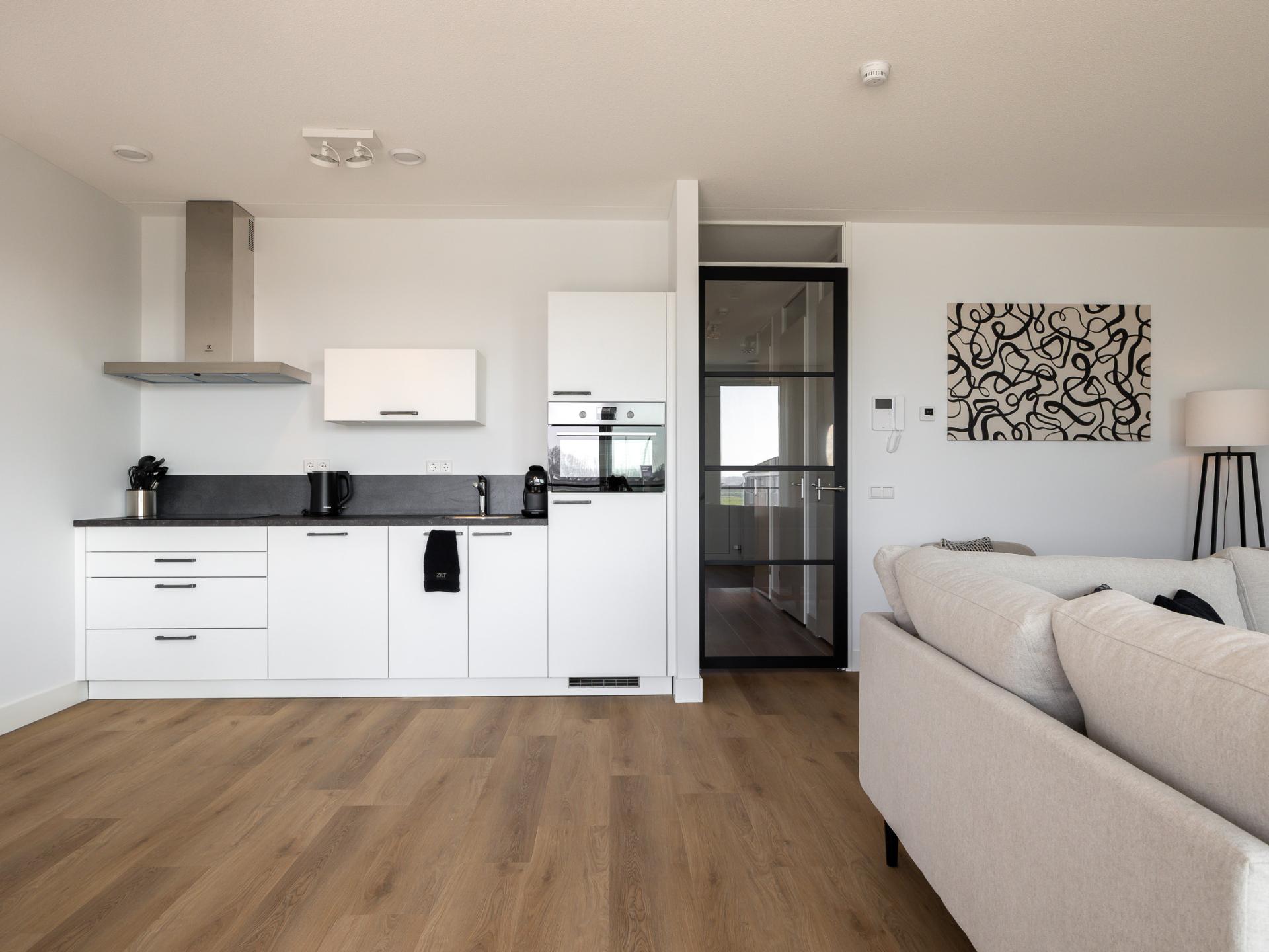 Stijlvol havenappartement met balkon en Sunshower in Kortgene - foto 5