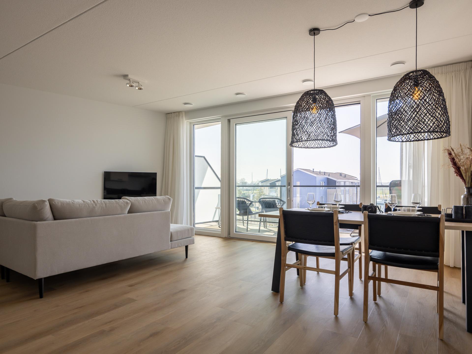 Stijlvol havenappartement met balkon en Sunshower in Kortgene - foto 10