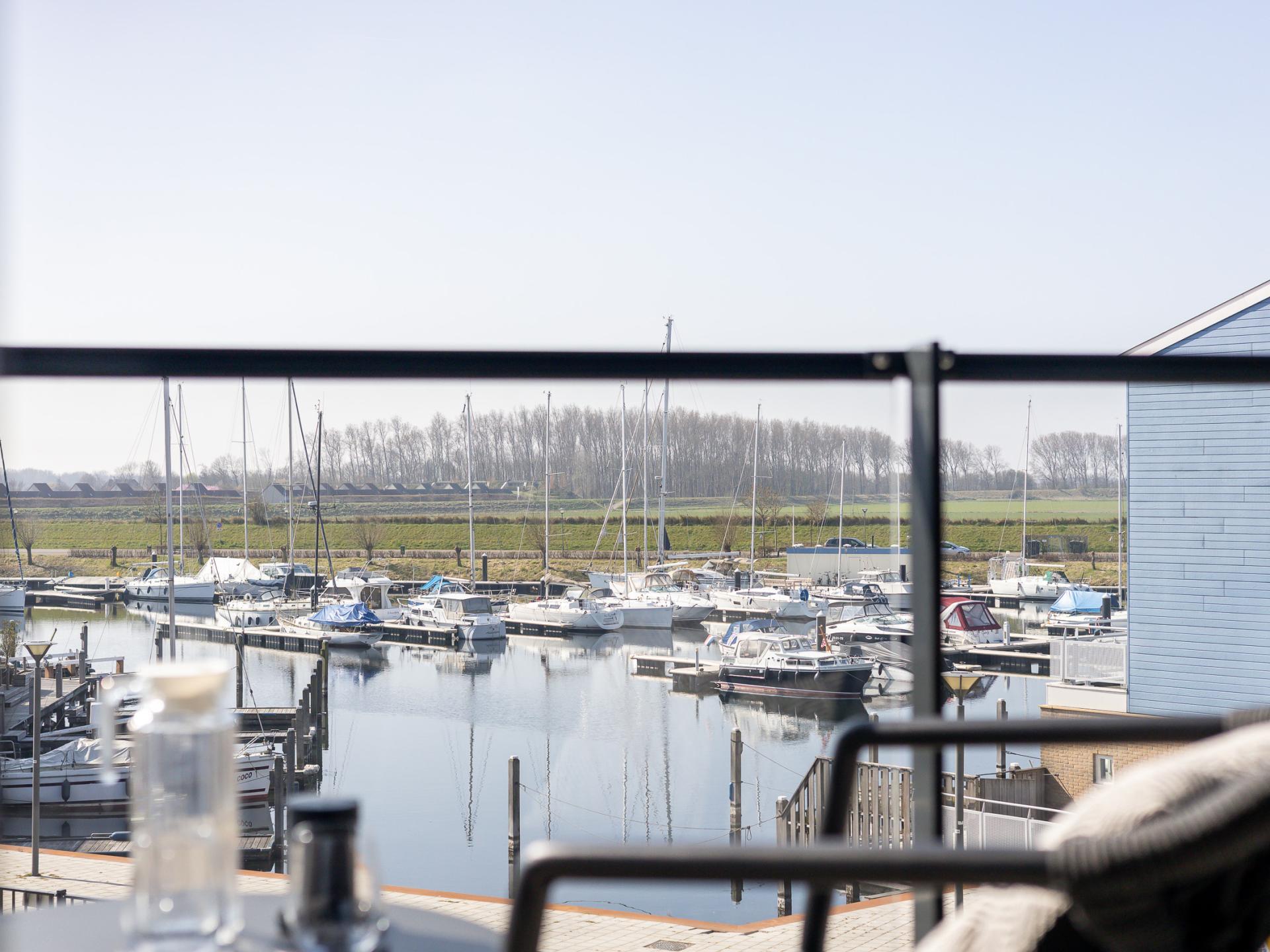 Stijlvol havenappartement met balkon en Sunshower in Kortgene - foto 23