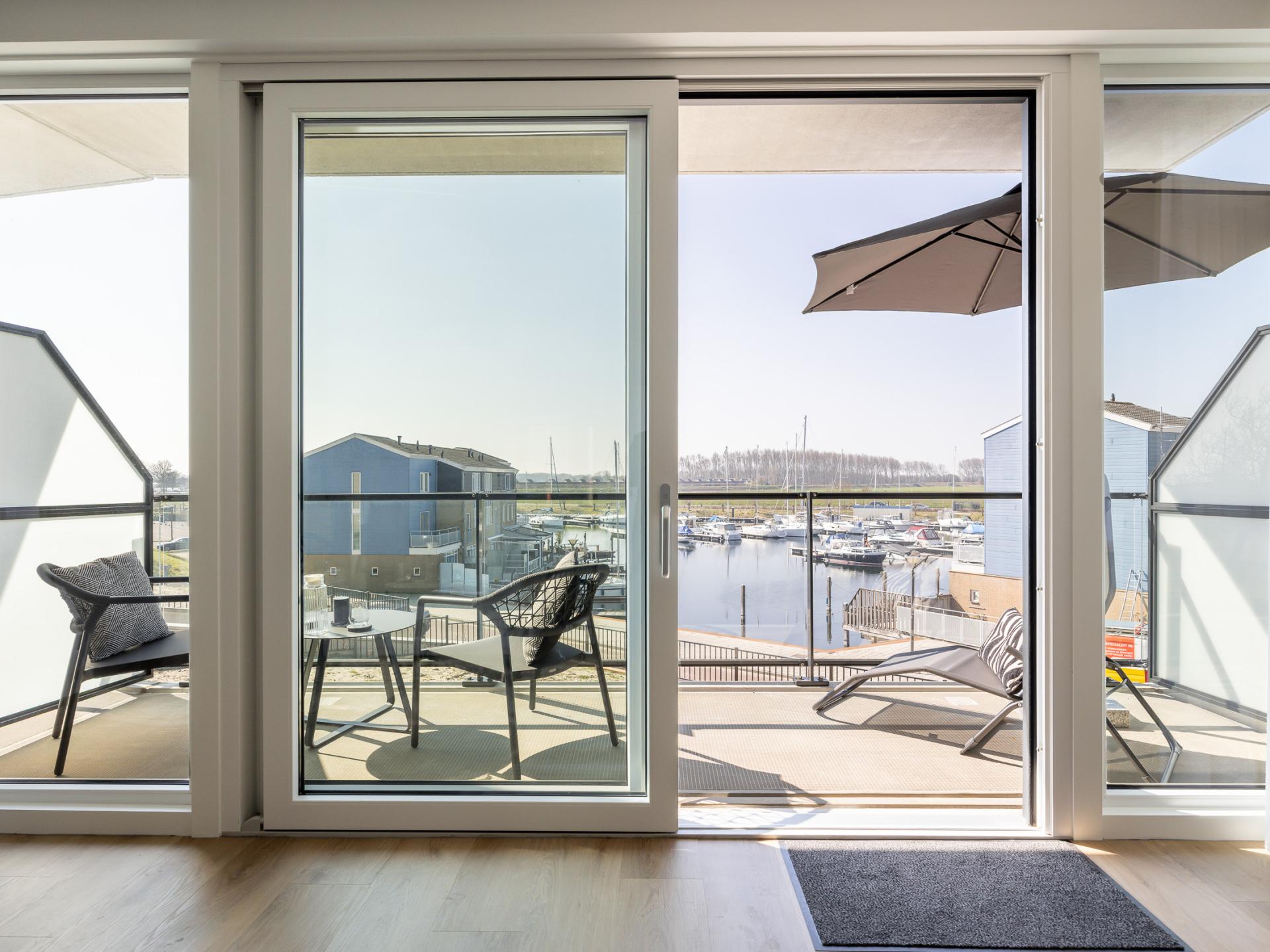 Stijlvol havenappartement met balkon en Sunshower in Kortgene - foto 20