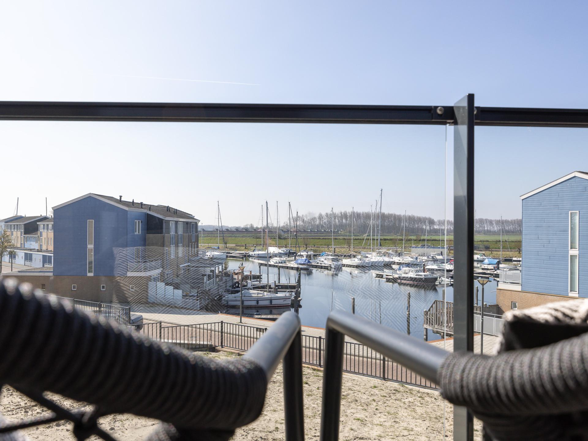 Stijlvol havenappartement met balkon en Sunshower in Kortgene - foto 22