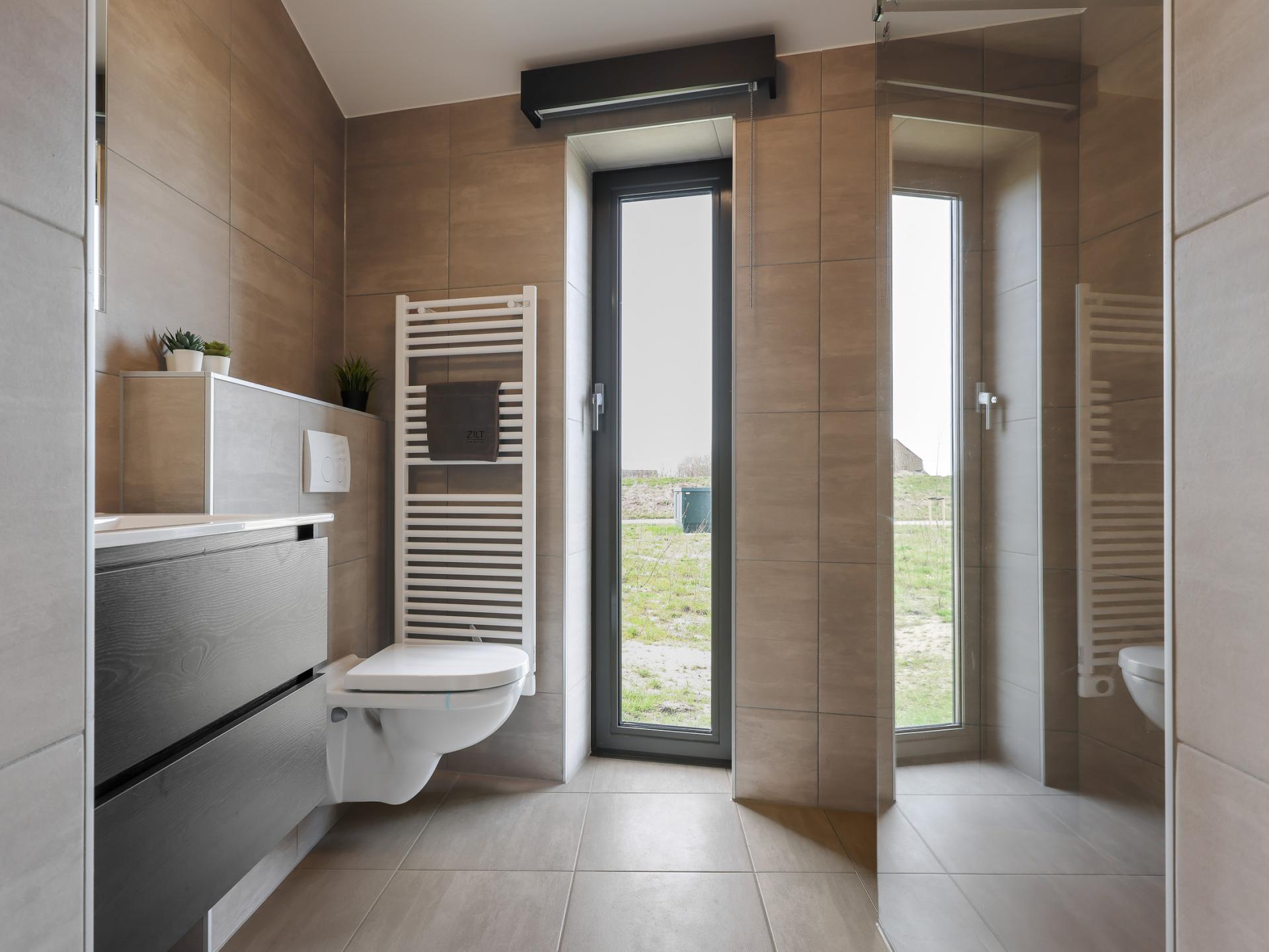 Modern vakantiehuis met wijds uitzicht over Zeeuwse polders, nabij strand - foto 21