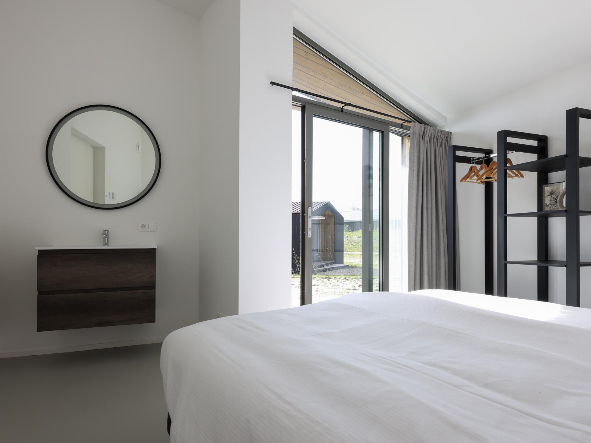 Modern vakantiehuis met wijds uitzicht over Zeeuwse polders, nabij strand - foto 33