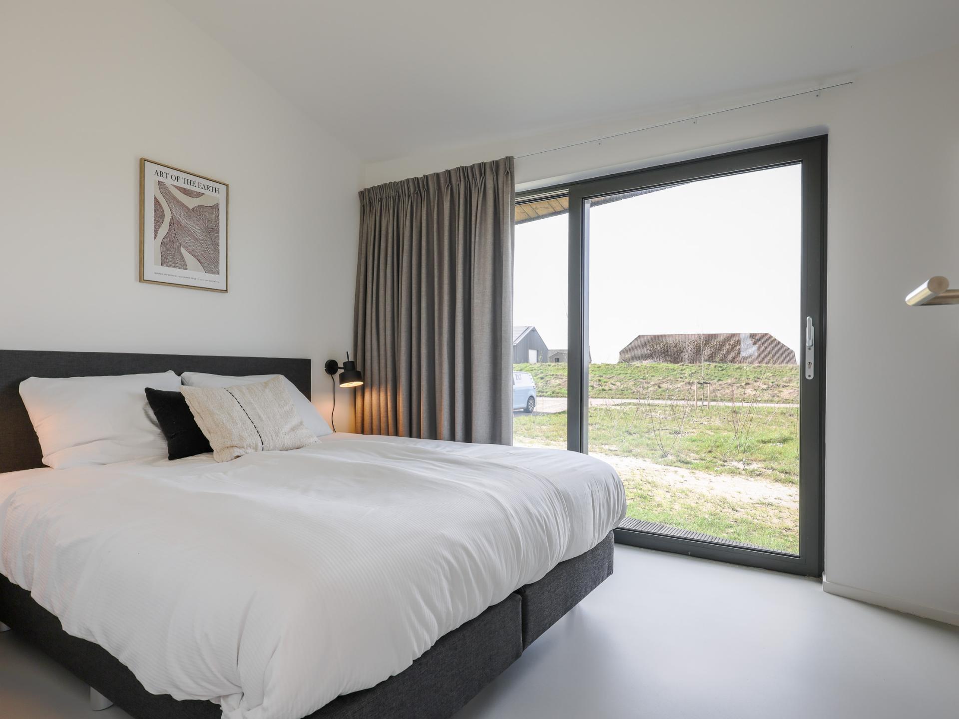 Modern vakantiehuis met wijds uitzicht over Zeeuwse polders, nabij strand - foto 27