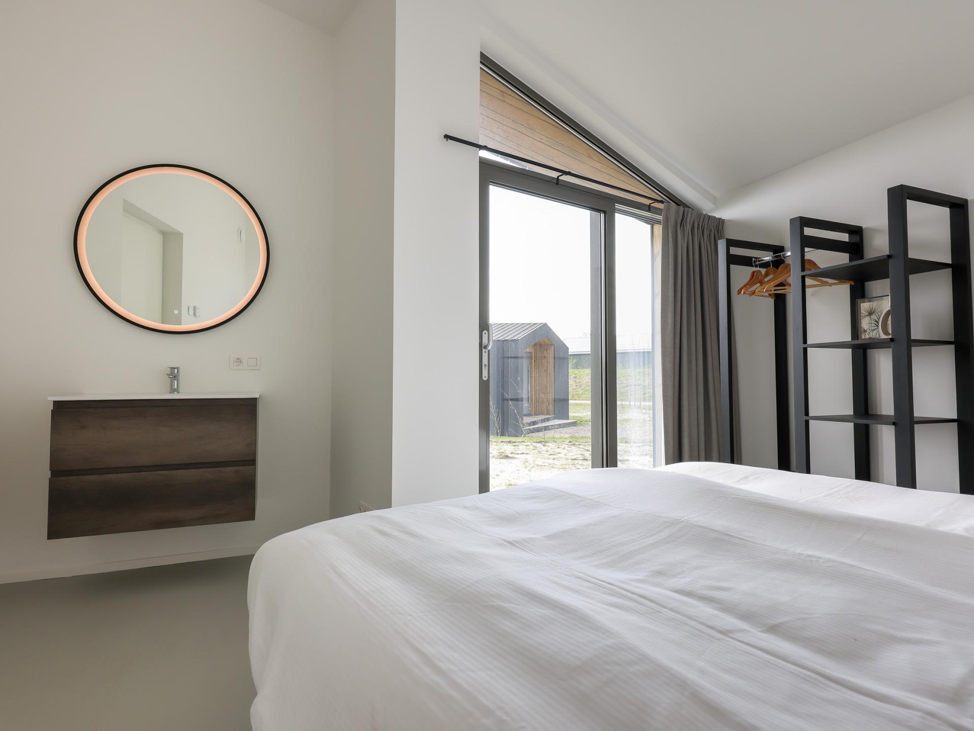 Modern vakantiehuis met wijds uitzicht over Zeeuwse polders, nabij strand - foto 32