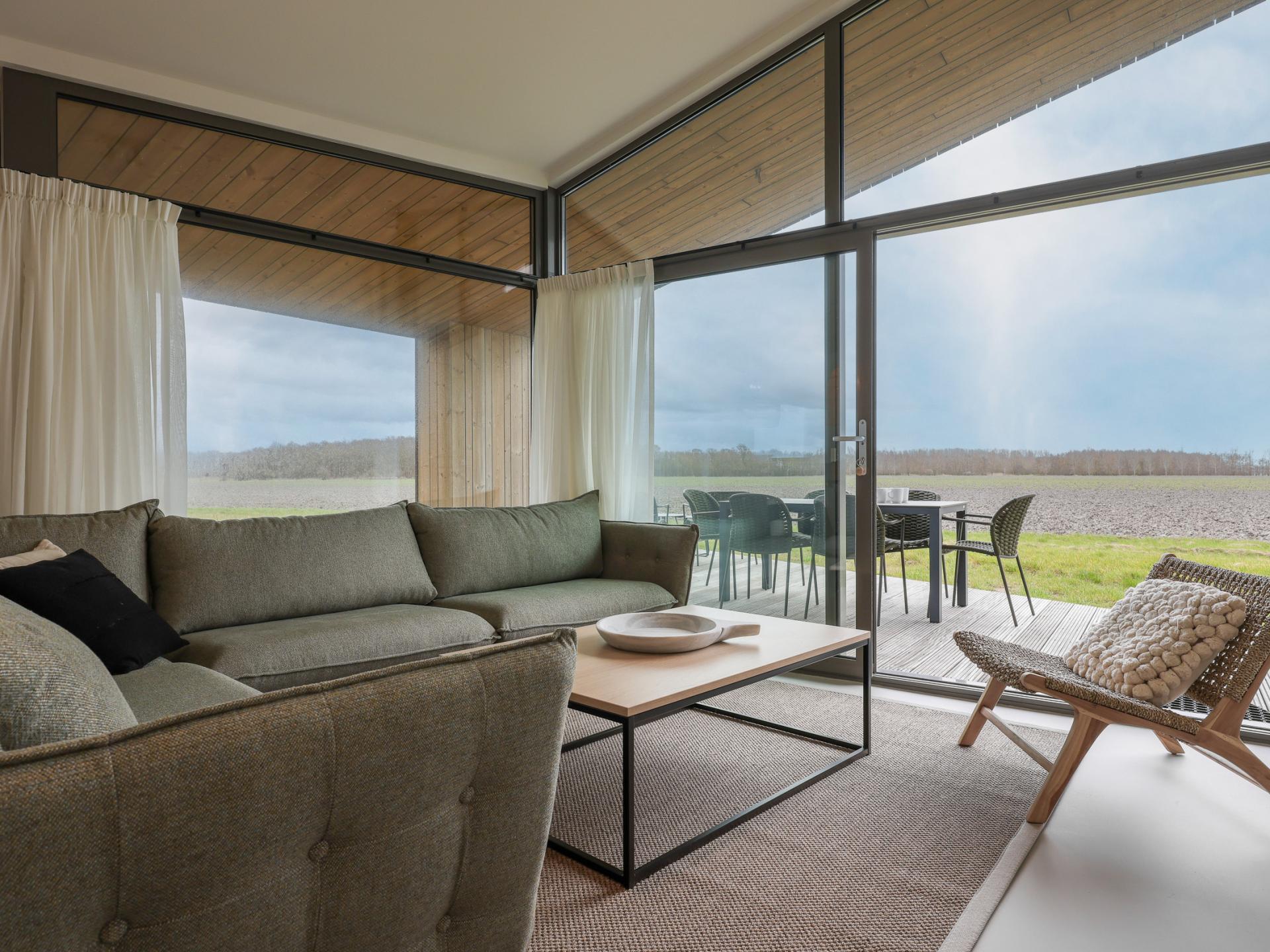 Vrijstaand natuurhuis in Zeeuws polderlandschap met uitzicht over de velden - foto 10