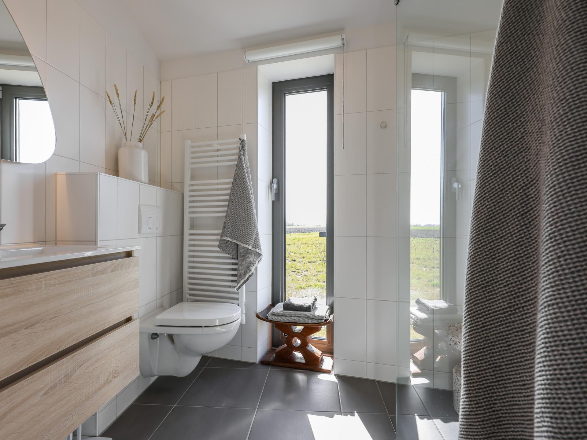 Natuurhuis met panoramisch terras aan het water in rustig Zeeland - foto 13
