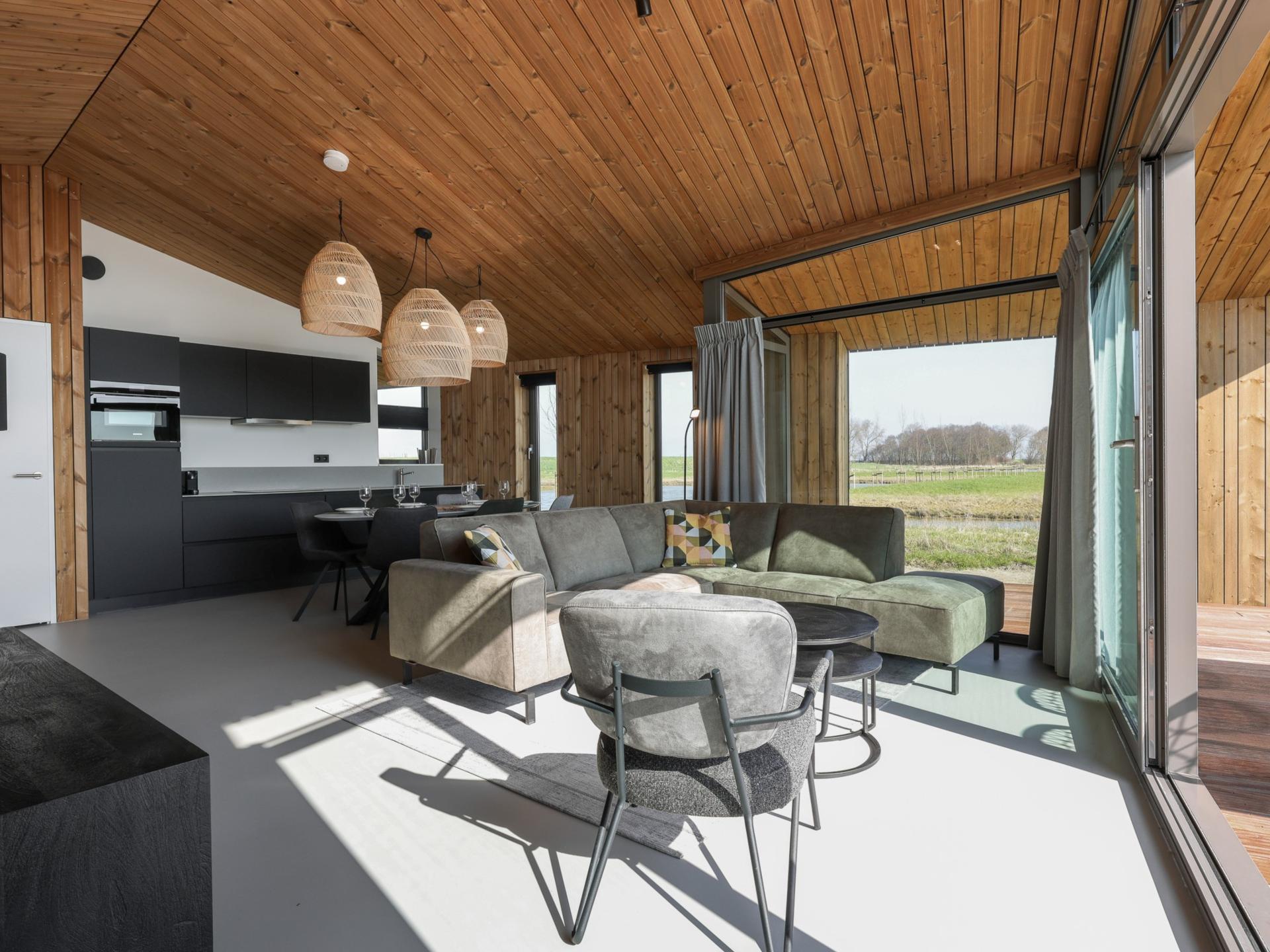Natuurhuis met overdekt terras aan water in Zeelandse polder - foto 7