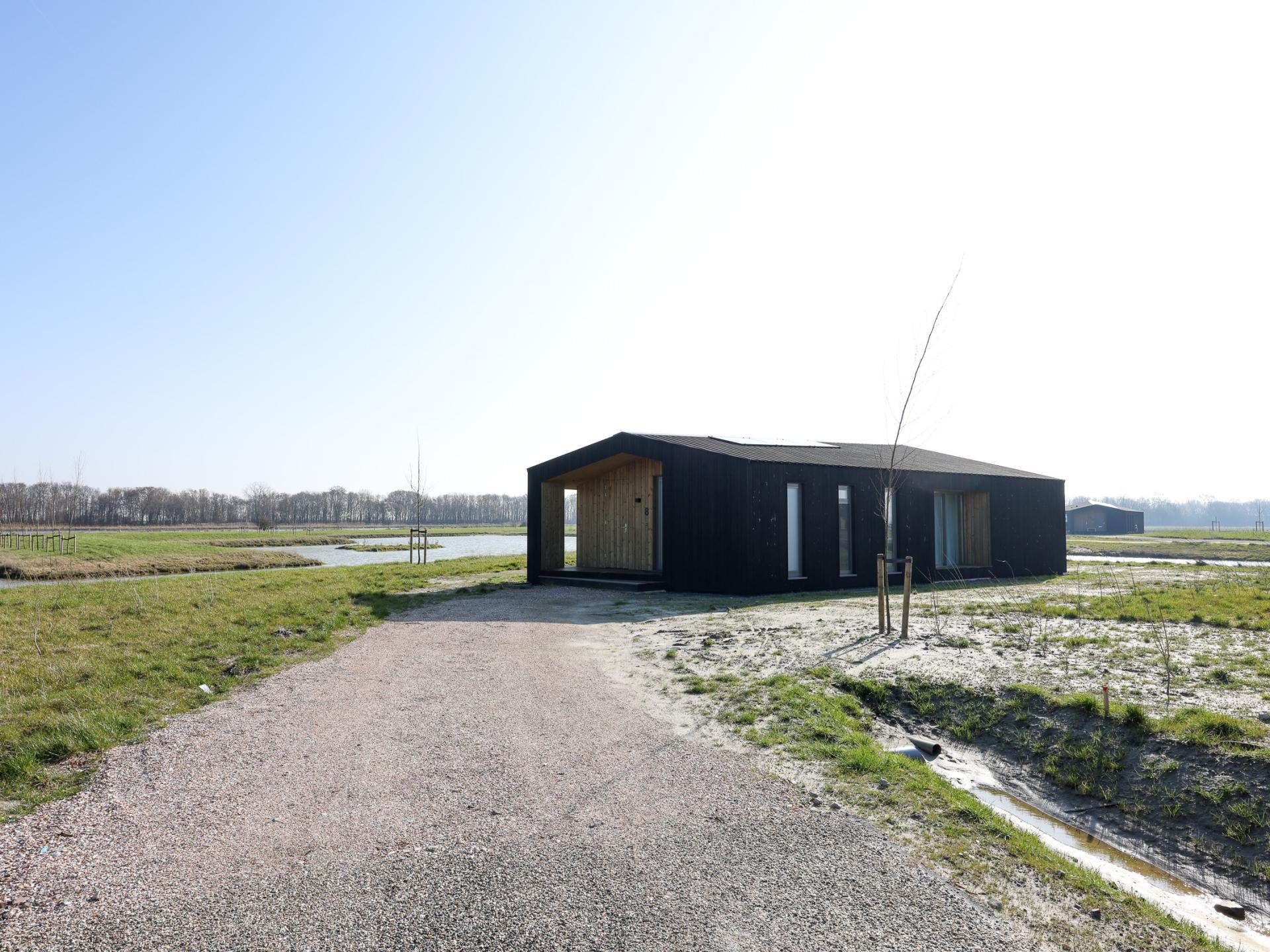 Natuurhuis met overdekt terras aan water in Zeelandse polder - foto 28