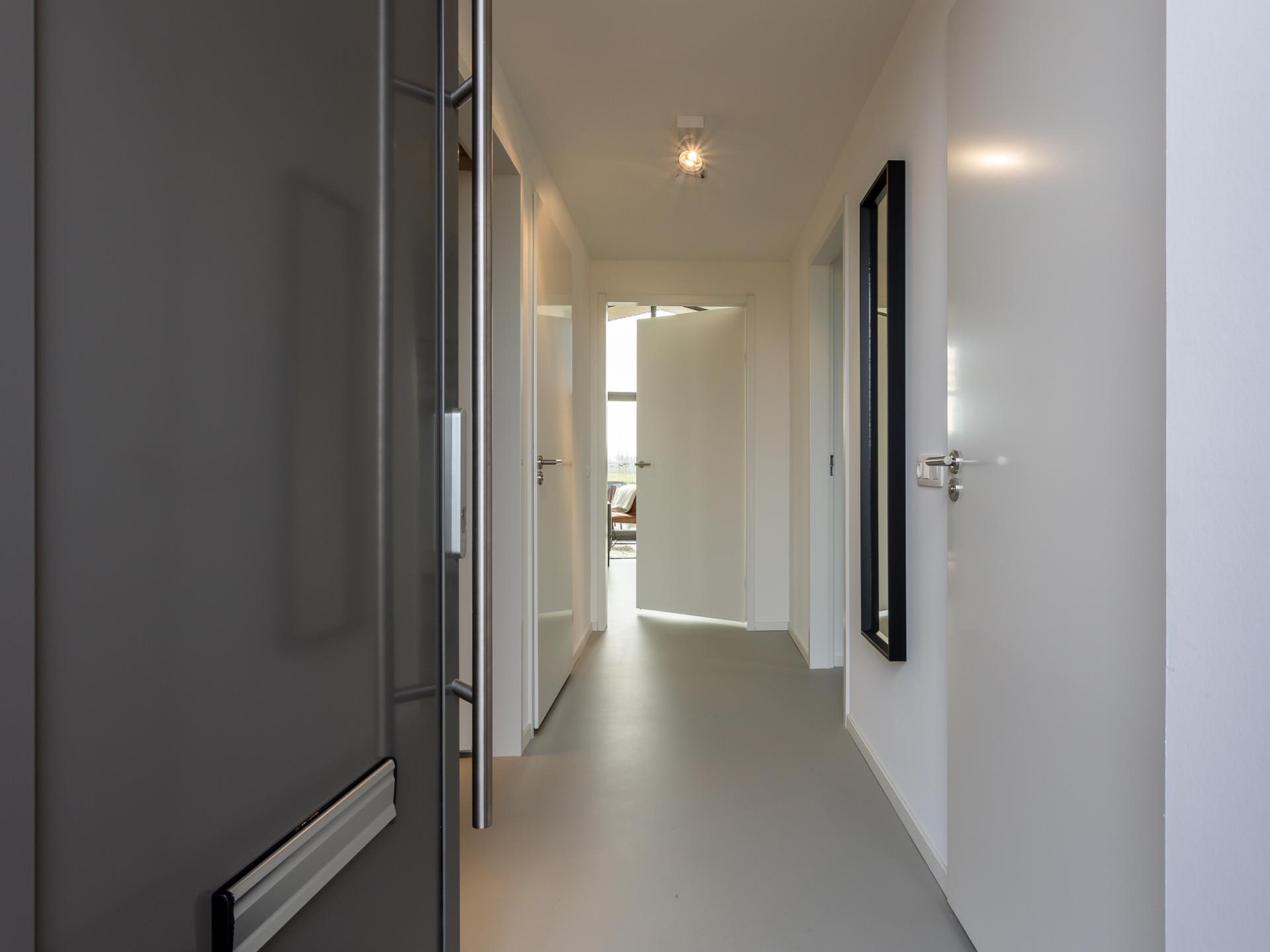 Natuurhuis met veranda in Wissenkerke, uitzicht over water en polder - foto 10