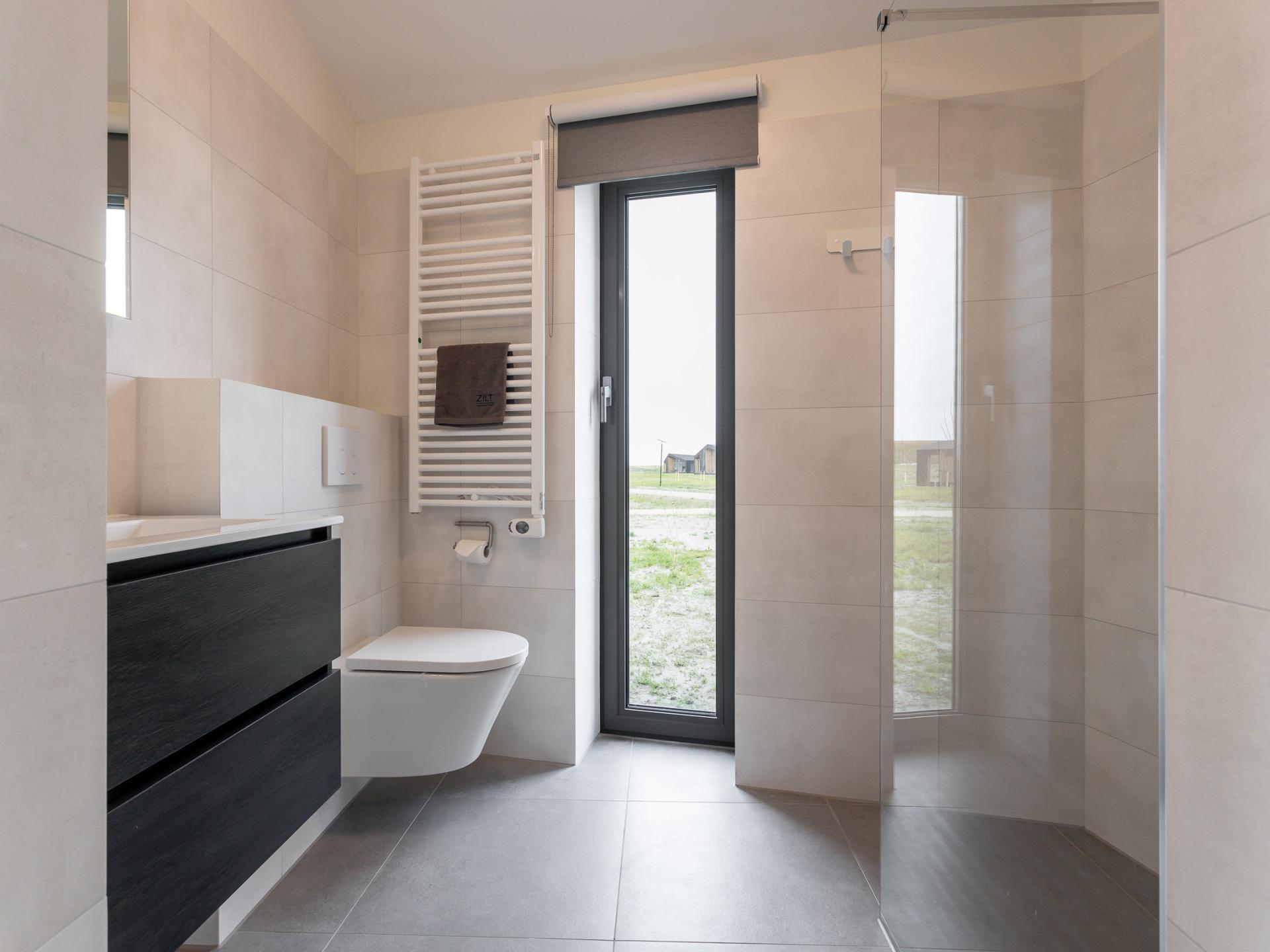 Natuurhuis met veranda in Wissenkerke, uitzicht over water en polder - foto 12