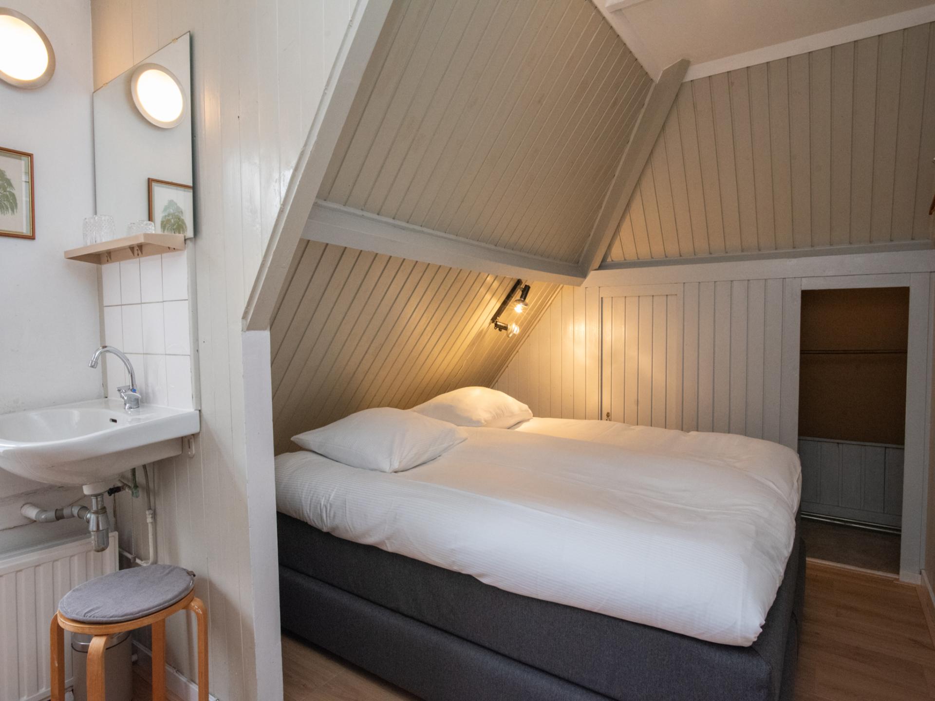 Duinhuis met sauna direct aan het Noordzeestrand in Vrouwenpolder - foto 35
