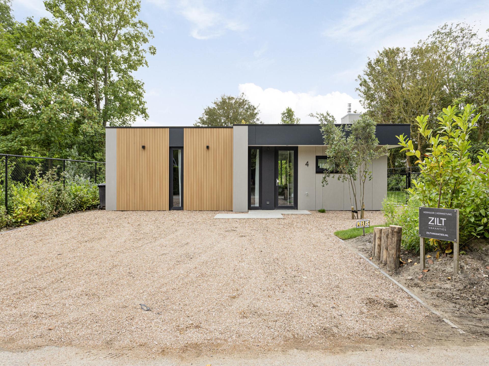 Wellness huisje met sauna en hottub op 330m van zee in Kamperland - foto 30
