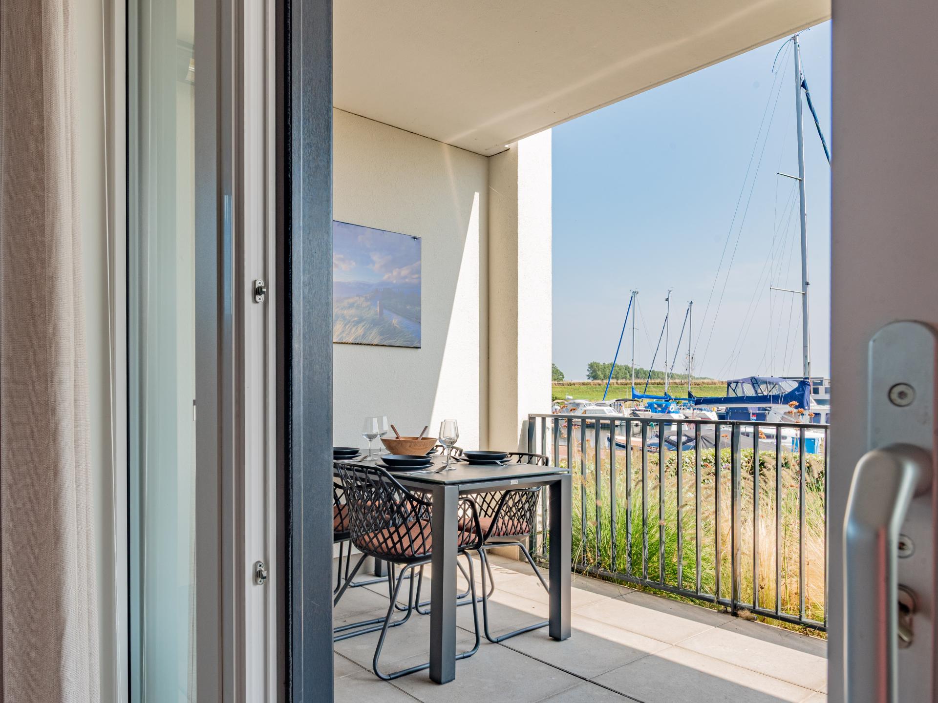 Luxe appartement aan de haven van Kamperland met terras aan het water - foto 28