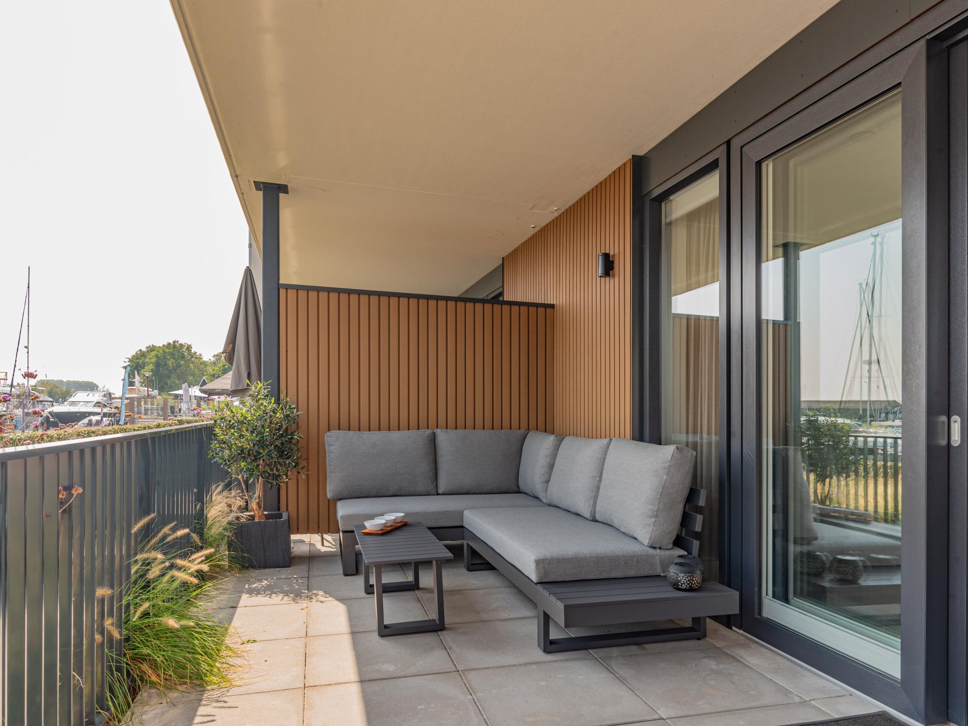 Luxe appartement aan de haven van Kamperland met terras aan het water - foto 26