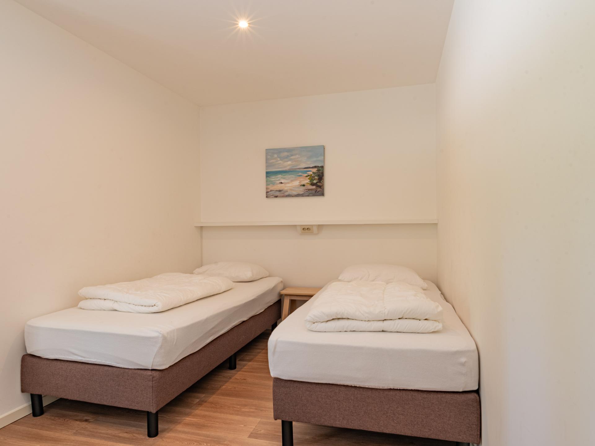 Vrijstaande strandbungalow met tuin op 110m van zee in Kamperland - foto 15