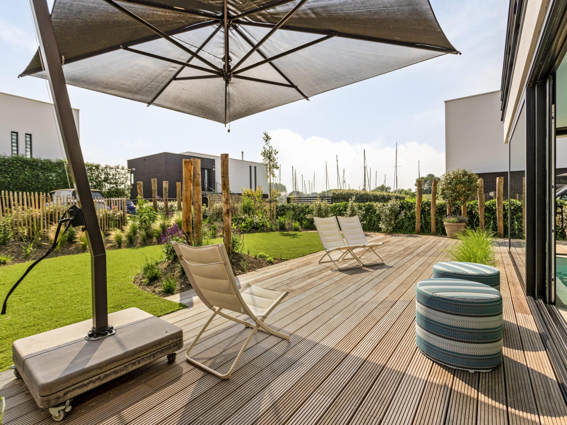 Luxe watervilla met zwembad en steiger aan het water in Kamperland - foto 35