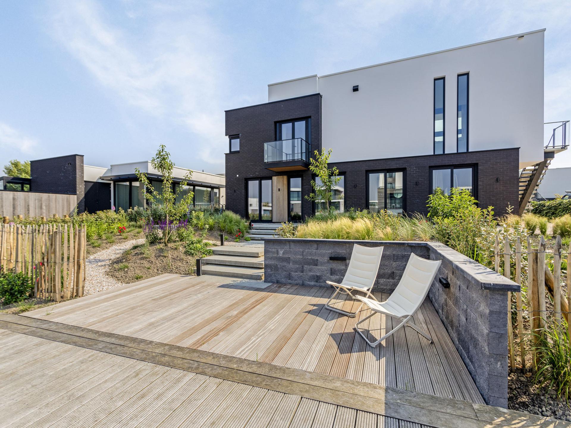 Luxe watervilla met zwembad en steiger aan het water in Kamperland - foto 34