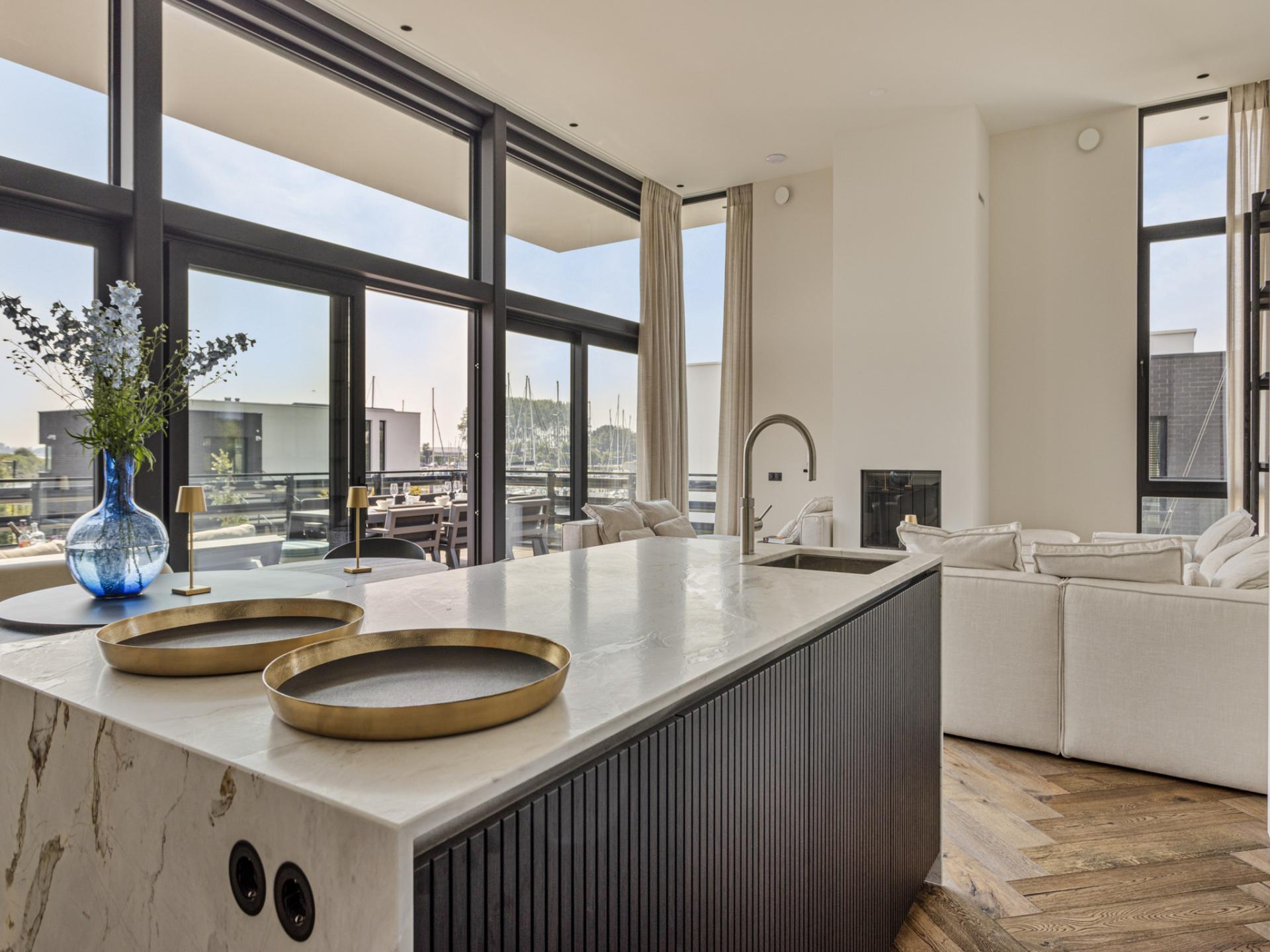 Luxe watervilla met zwembad en steiger aan het water in Kamperland - foto 7