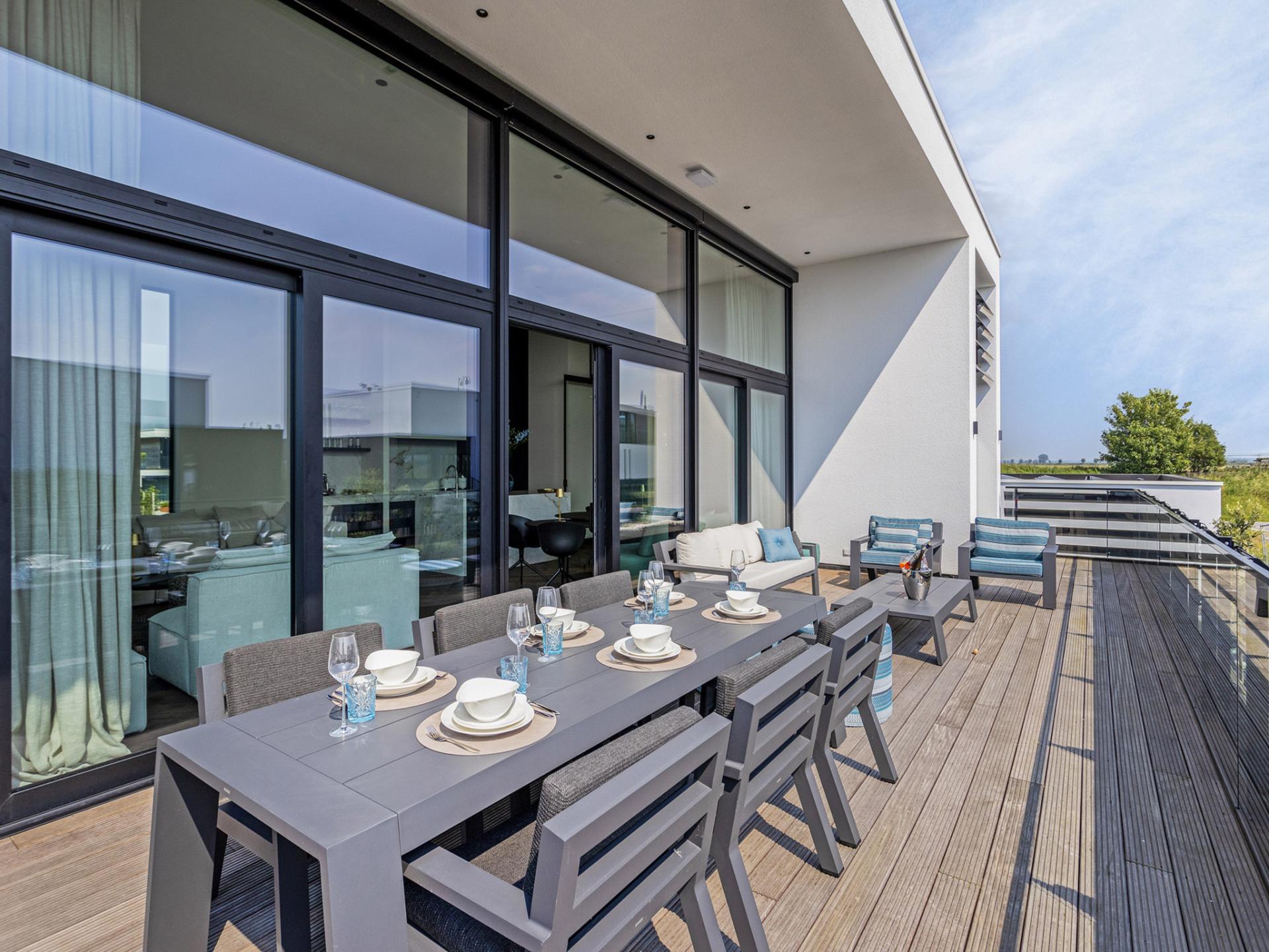 Luxe watervilla met zwembad en steiger aan het water in Kamperland - foto 6