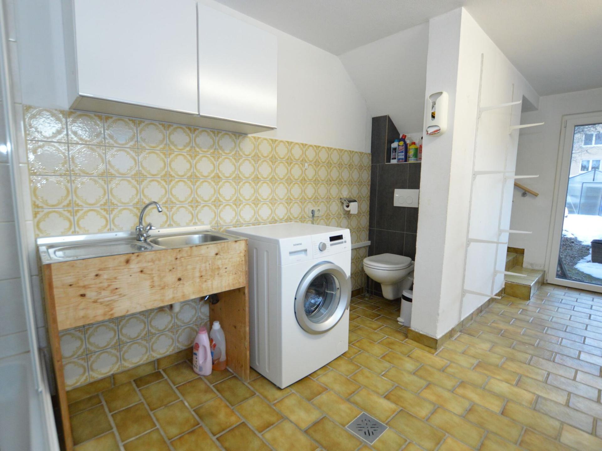 Licht appartement met serre & grote tuin in Saalfelden, vlakbij skilift - foto 29