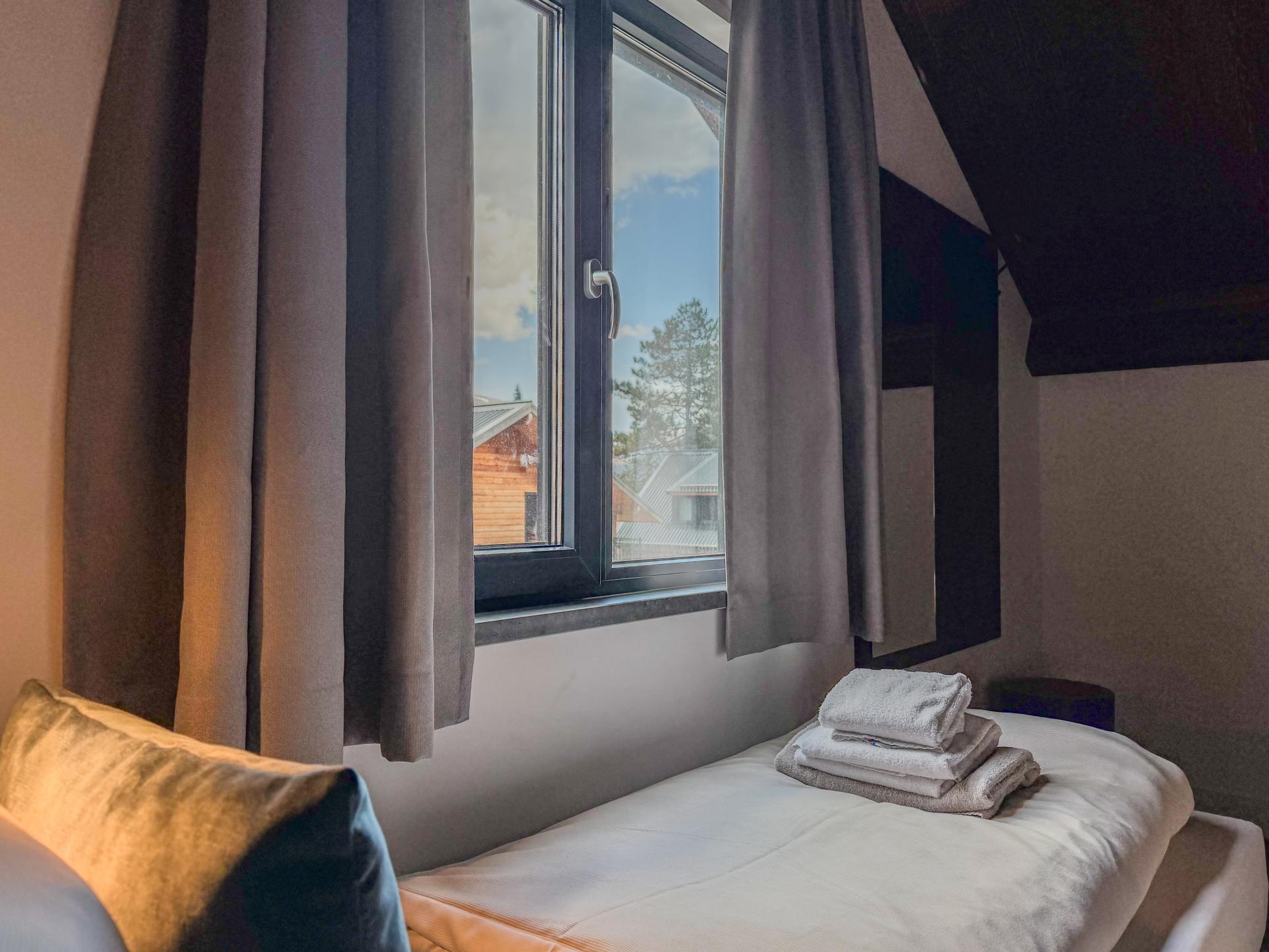 Luxe chalet met privésauna en uitzicht op de Afritzer See - foto 31