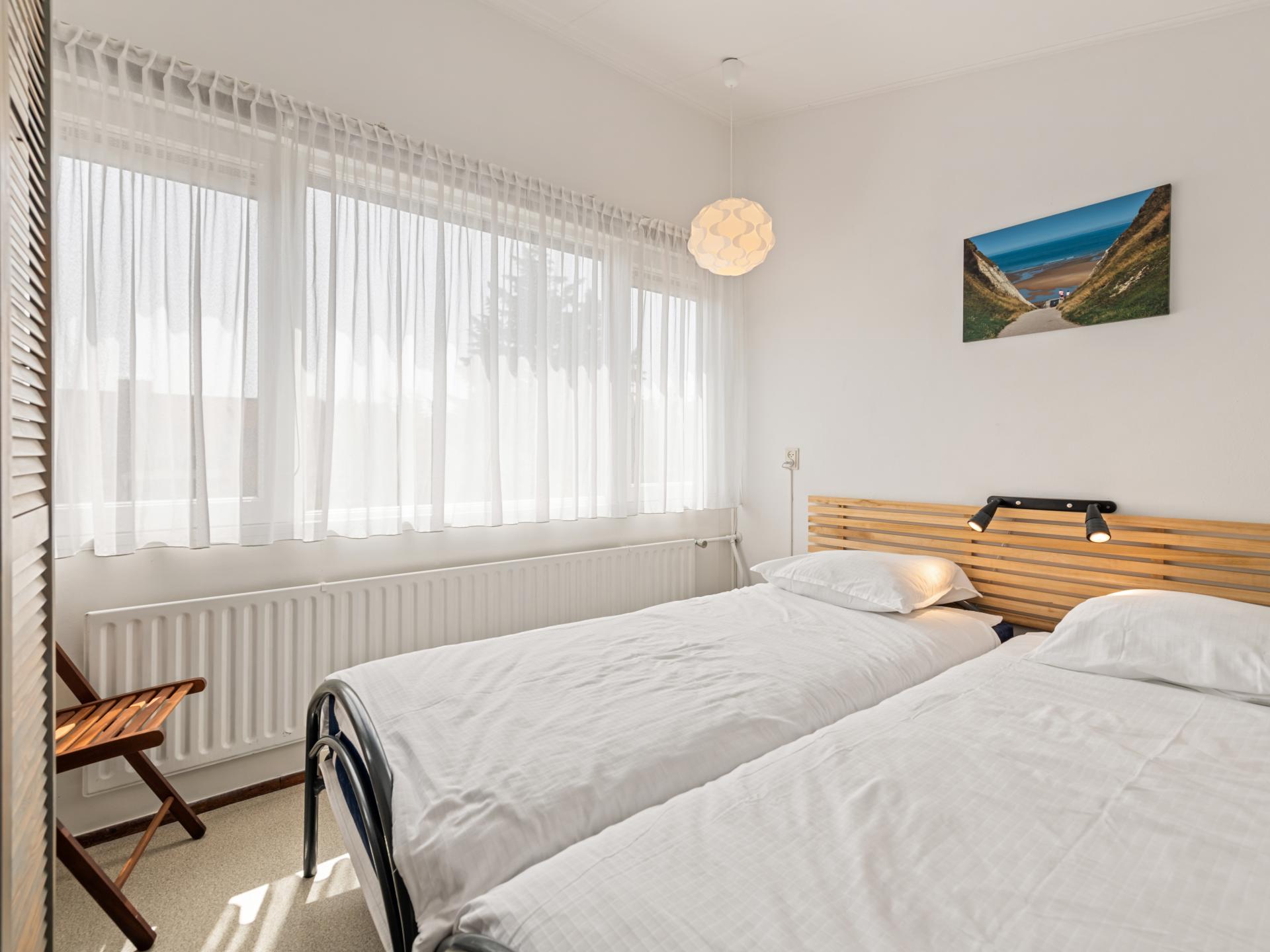 Sfeervol strandhuis direct aan zee met tuin in Nieuwvliet - foto 12