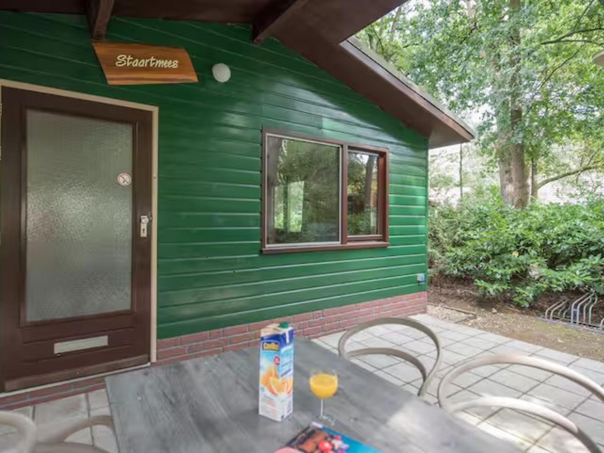 Vrijstaande bungalow De Wielewaal met overdekt terras in bosrijk Heesch - foto 9