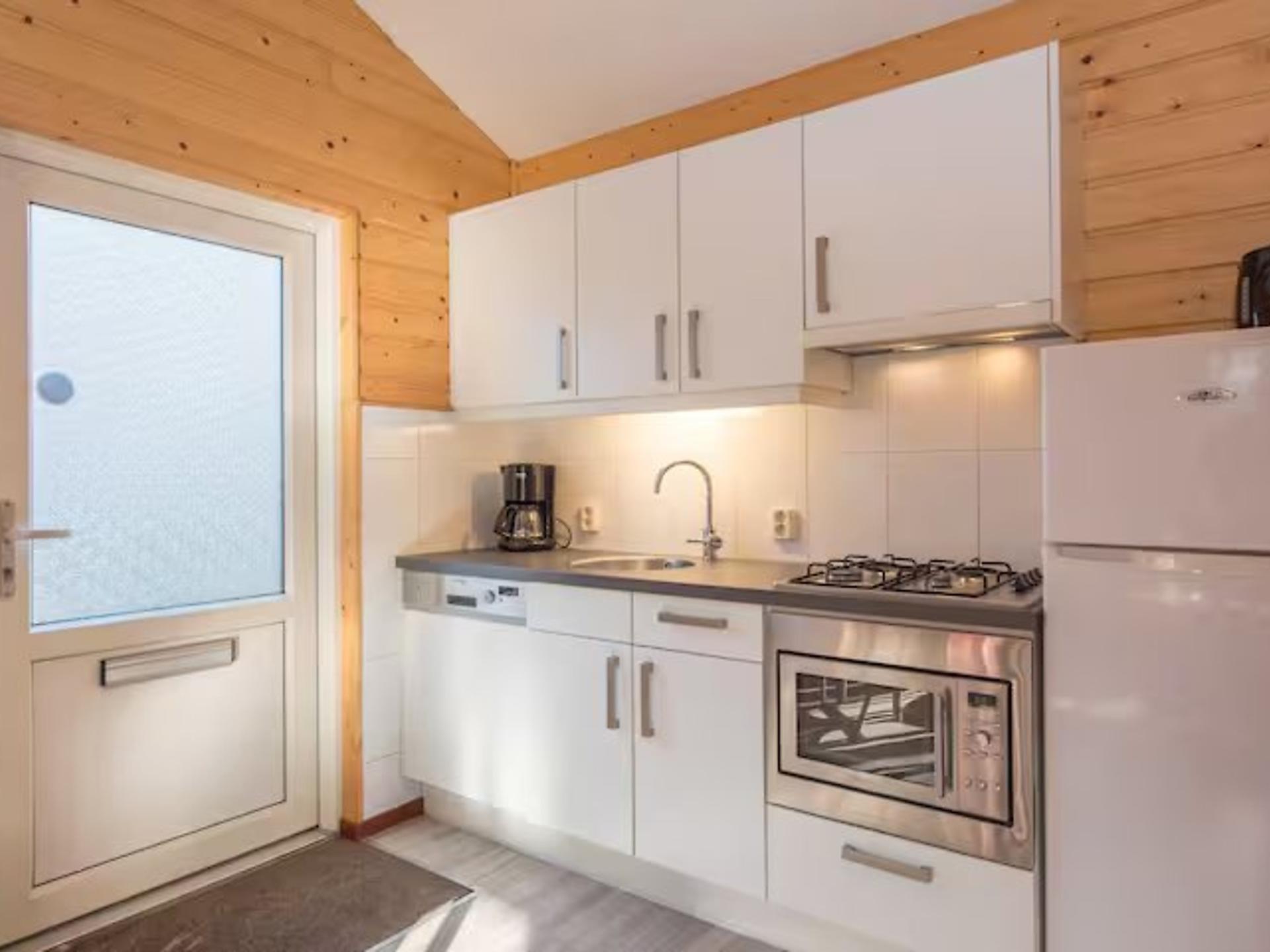 Vrijstaande bungalow met bad en uitzicht op de vijver in Heesch - foto 11