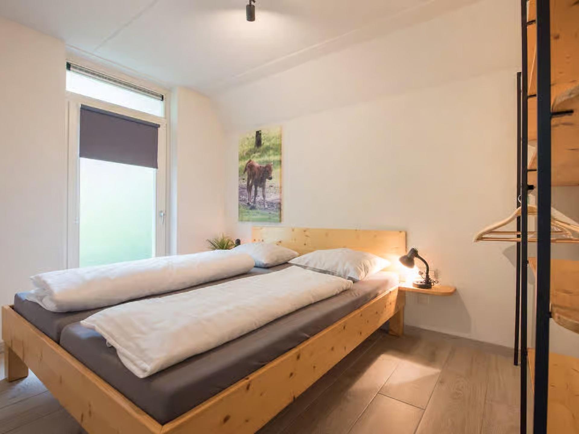 Vrijstaande Oeverzwaluw: luxe lodge aan de vijver in Heesch - foto 12