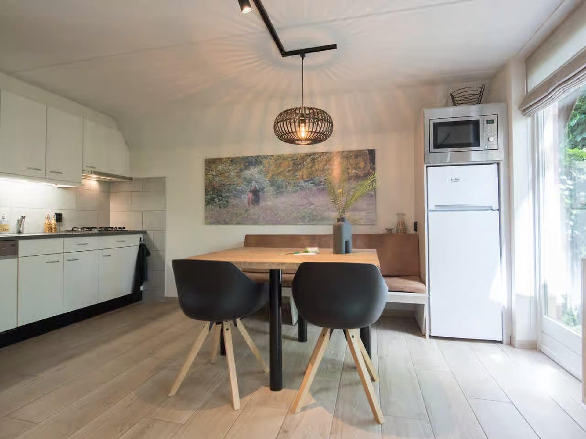 Vrijstaande Oeverzwaluw: luxe lodge aan de vijver in Heesch - foto 4