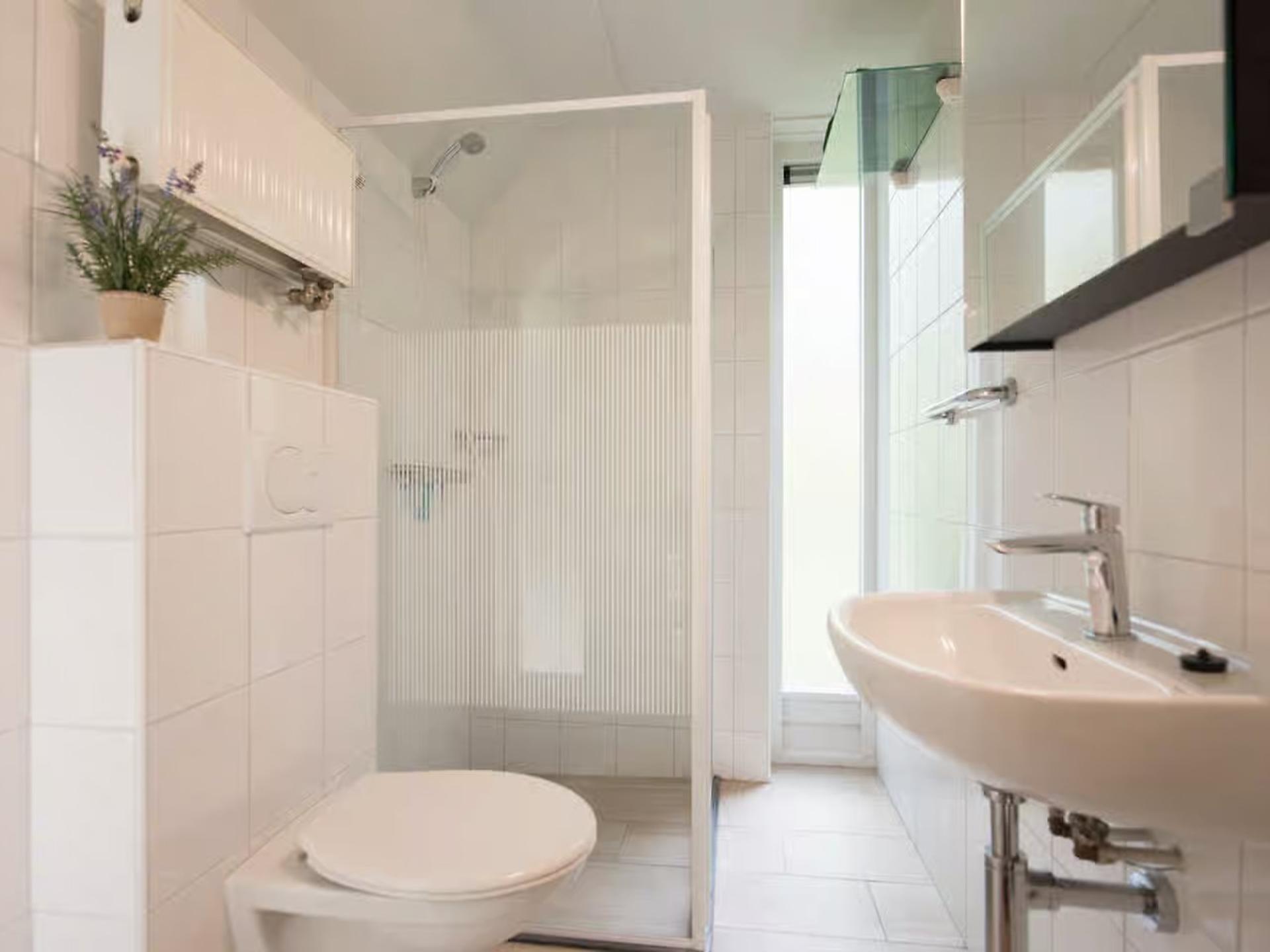Vrijstaande Oeverzwaluw: luxe lodge aan de vijver in Heesch - foto 11