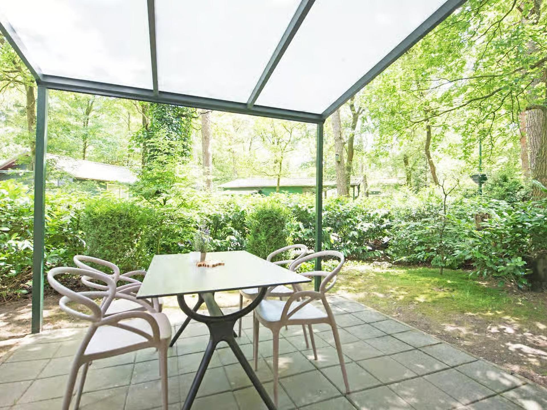 Vrijstaande Oeverzwaluw: luxe lodge aan de vijver in Heesch - foto 2