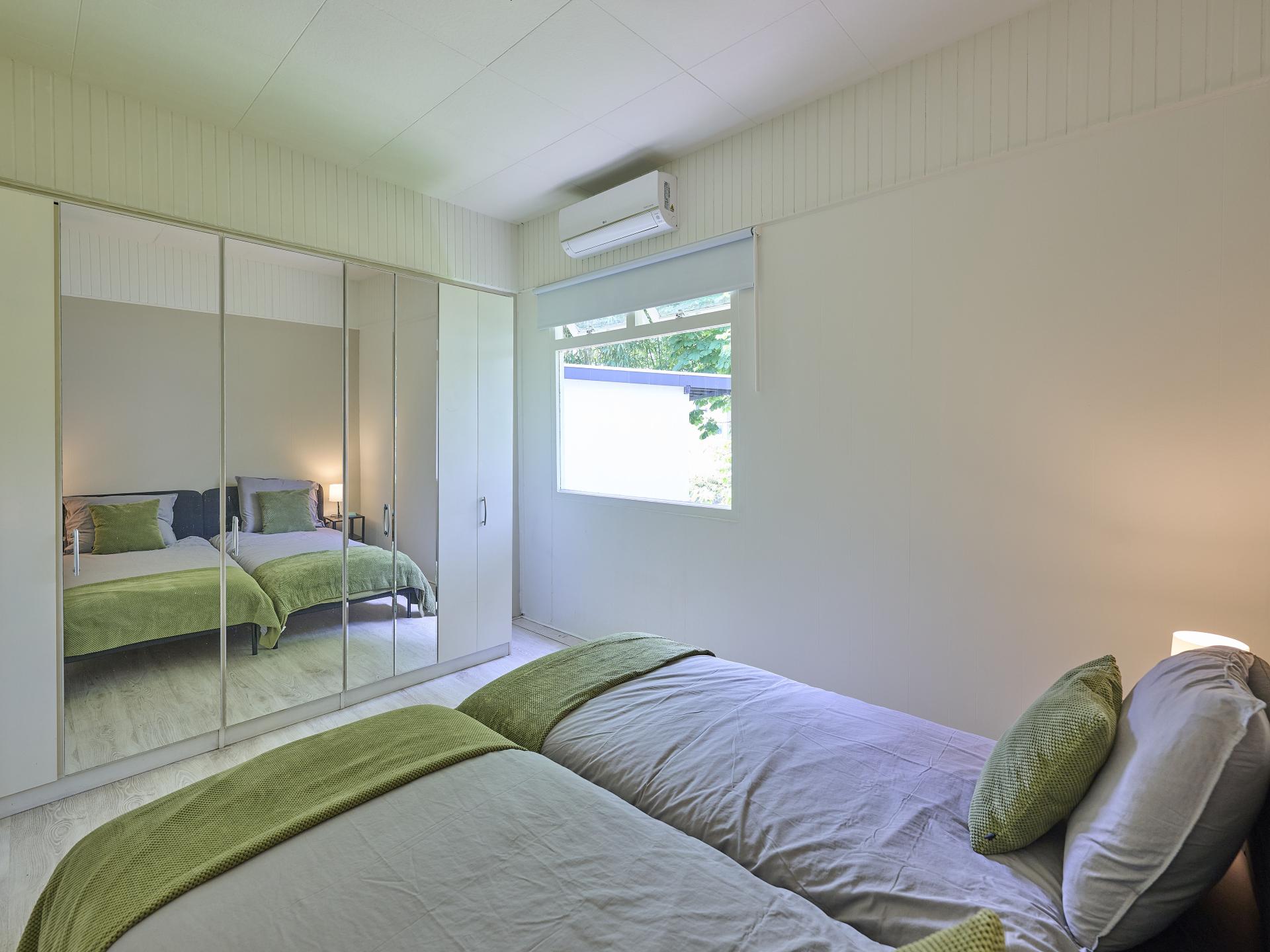 Vrijstaande bungalow op Resort de Brabantse Kempen met zwembad en bosrijke omgeving - foto 23