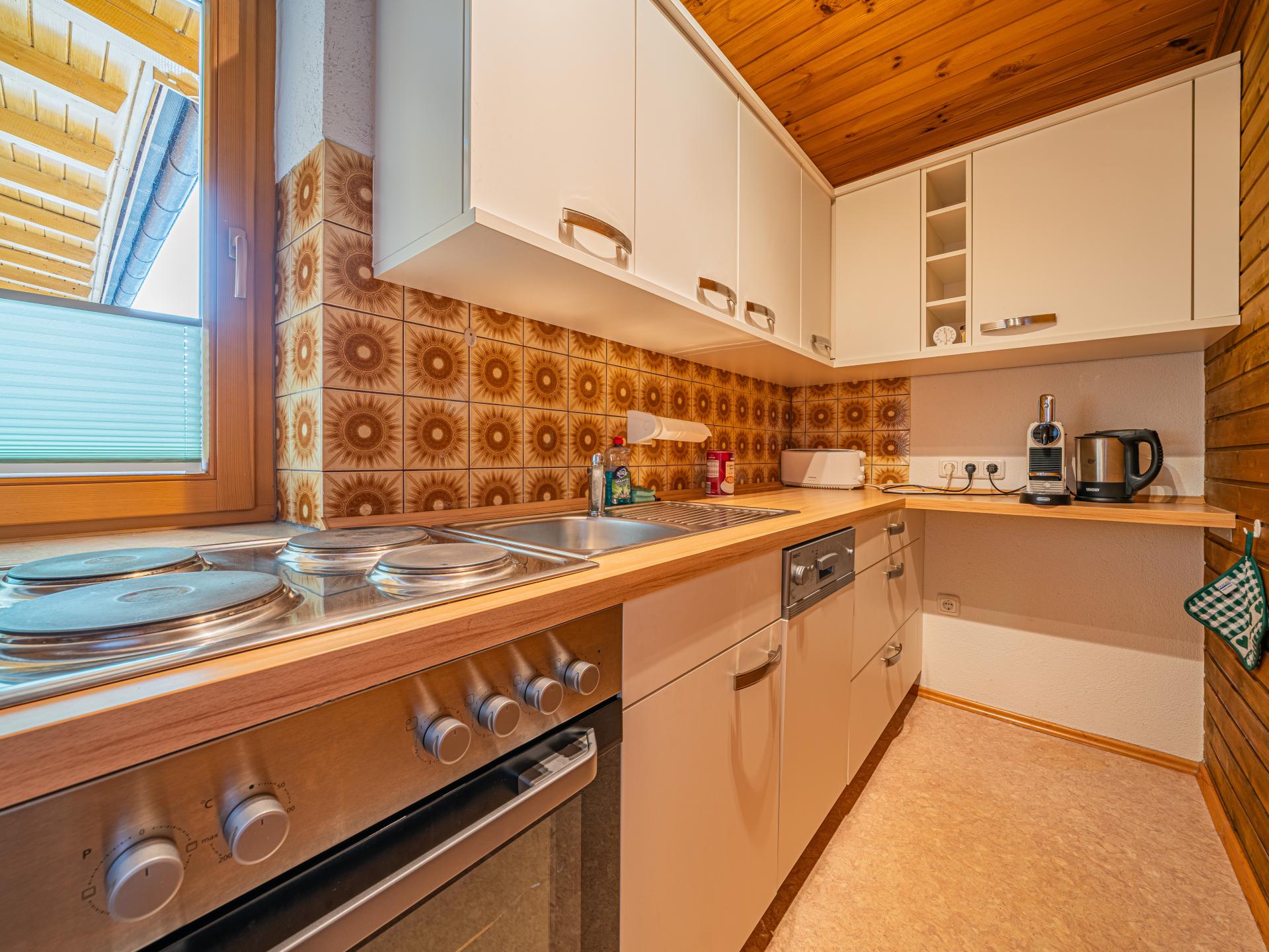 Knus Tiroler appartement in Söll, 270m van de skipiste - foto 20