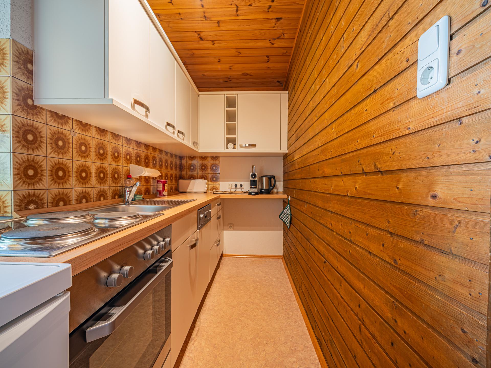 Knus Tiroler appartement in Söll, 270m van de skipiste - foto 13
