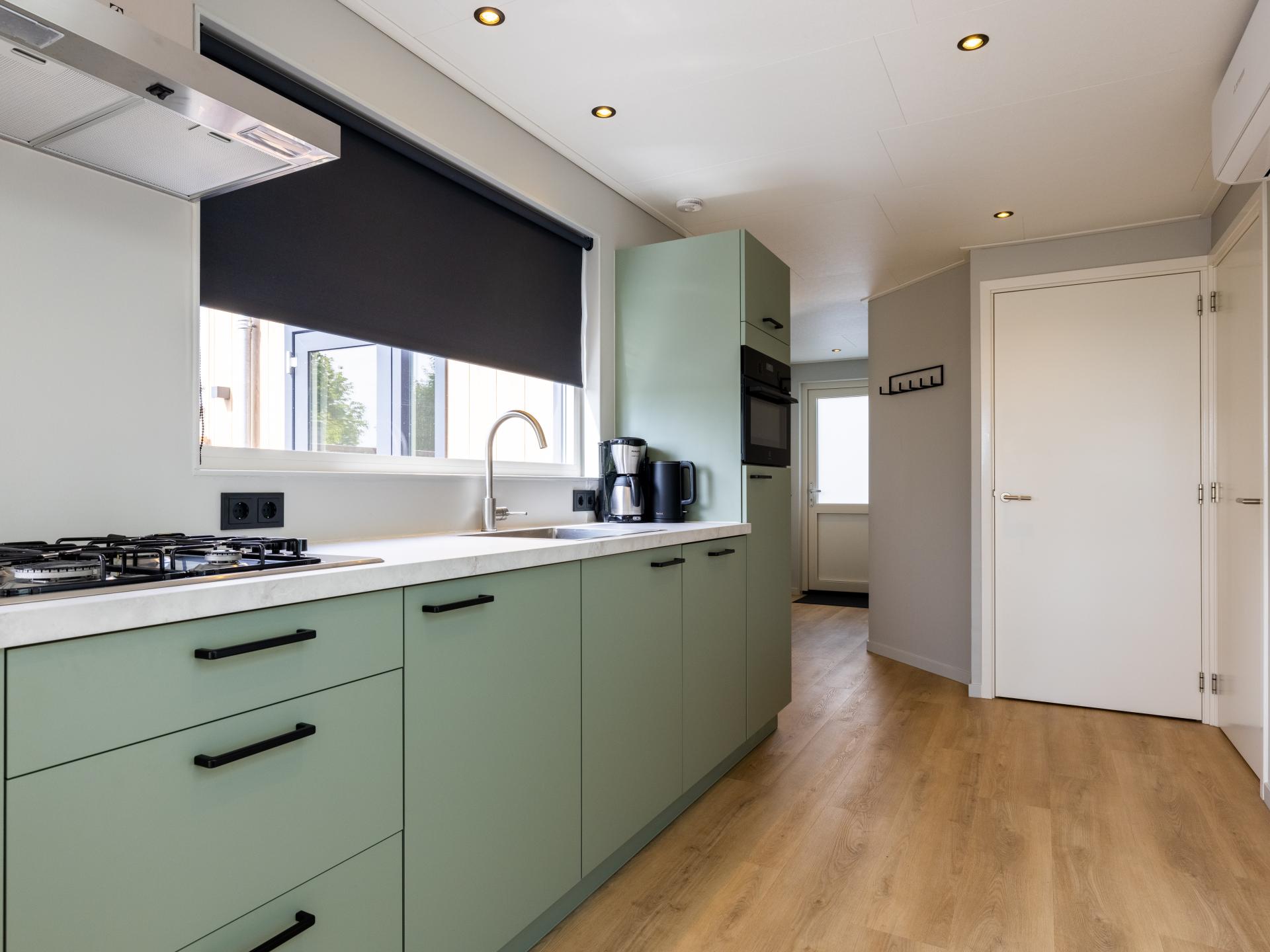 Nieuw chalet aan het water met eigen sloep in Bantega - foto 20