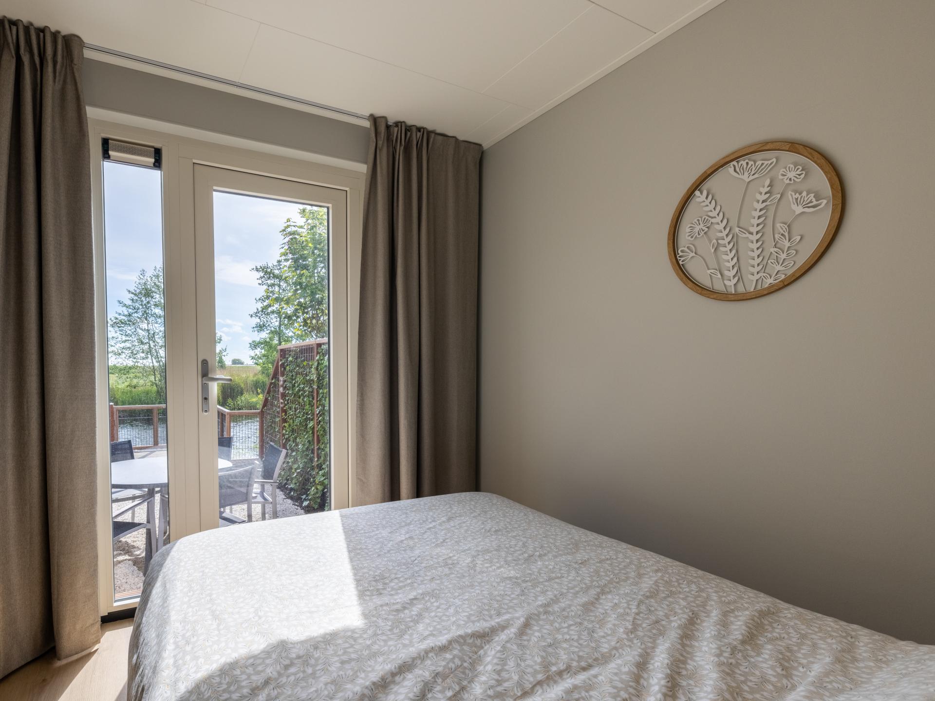 Nieuw chalet aan het water met eigen sloep in Bantega - foto 6