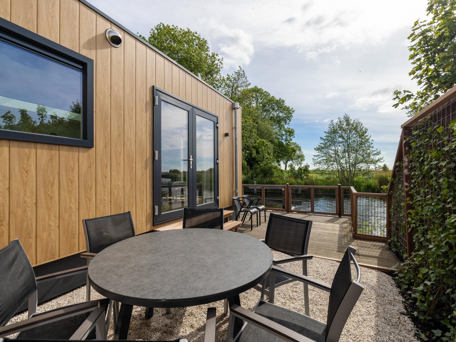 Nieuw chalet aan het water met eigen sloep in Bantega - foto 25