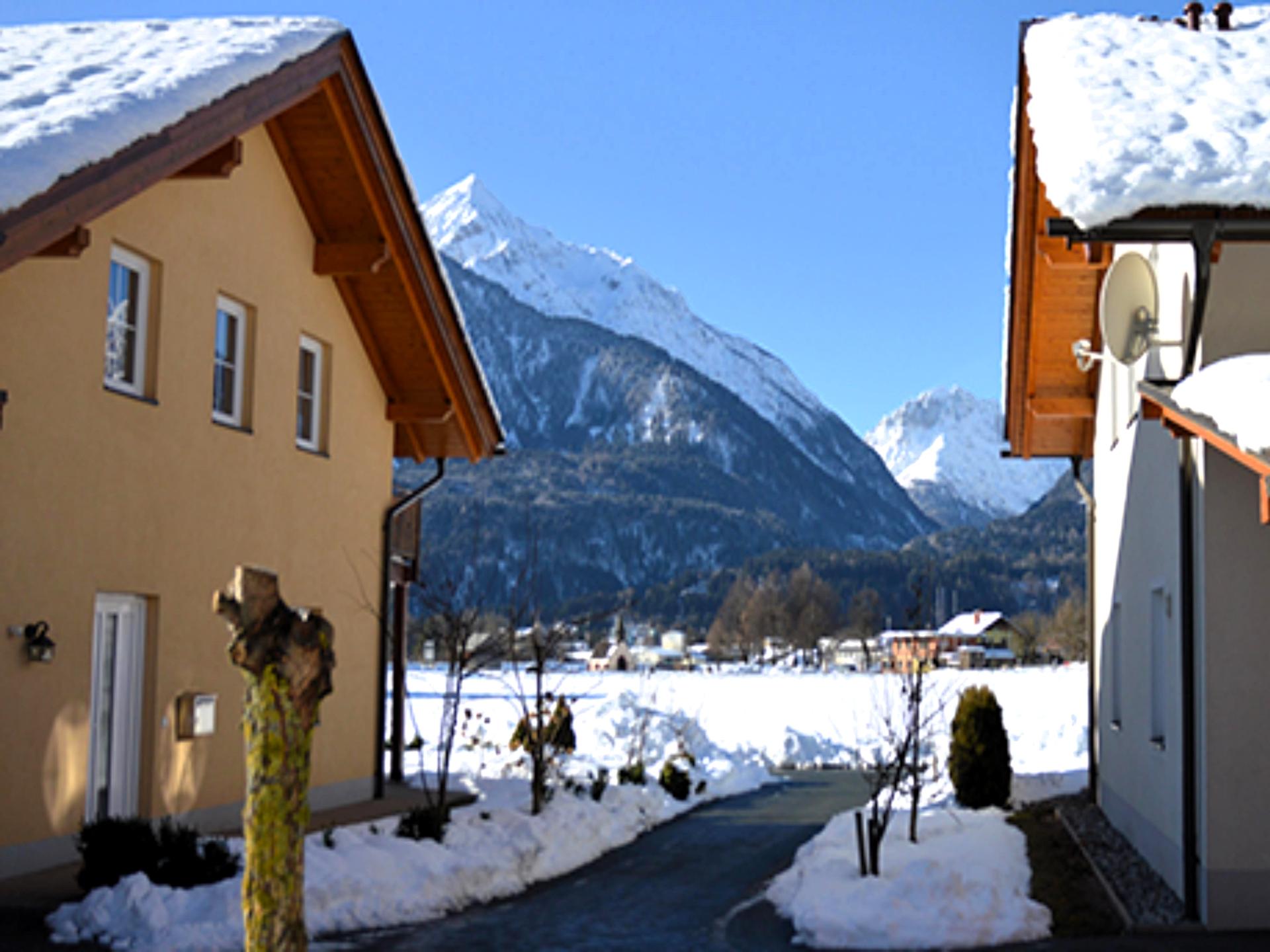 Zonnig chalet in Kötschach-Mauthen met grote tuin en bergzicht - foto 21