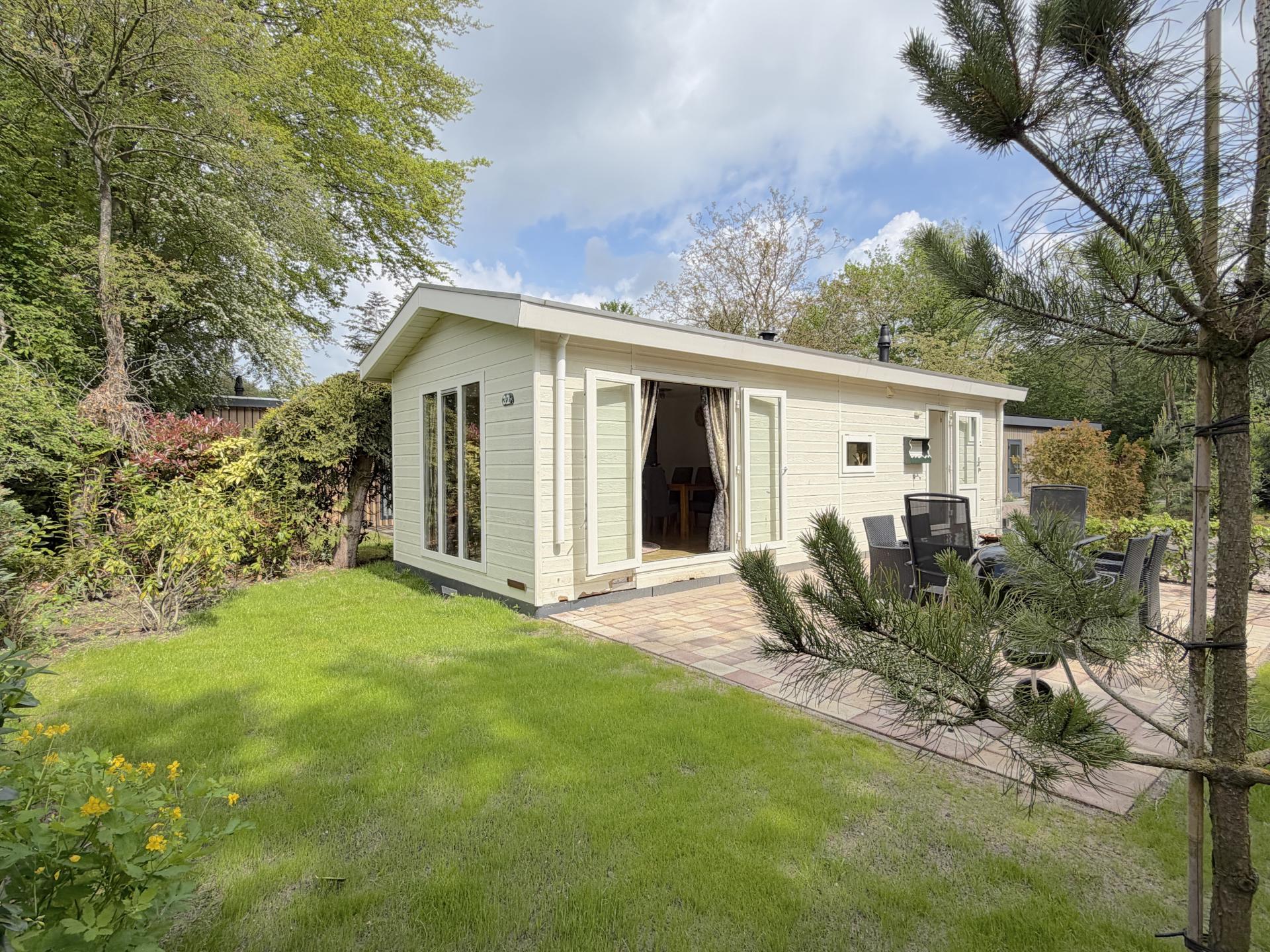 Knus chalet aan de bosrand met zonnig terras in Hulshorst - foto 14