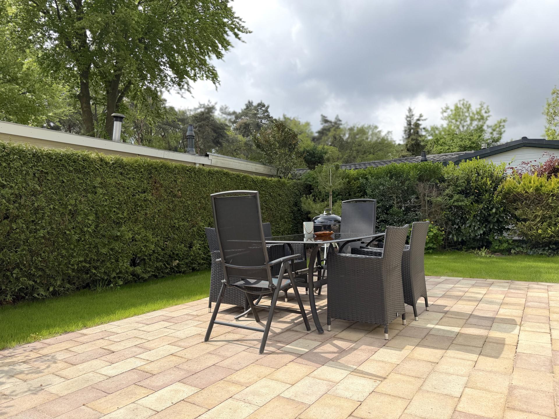 Knus chalet aan de bosrand met zonnig terras in Hulshorst - foto 17